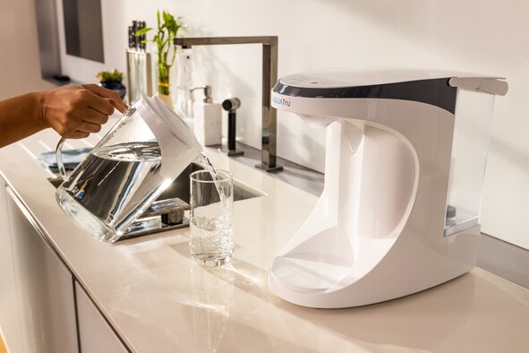 AquaTru Carafe unit on kitchen counter