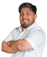 Photo of Yair Sanchez, in a white shirt overlooking a white silhouette