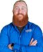 Photo of Noah Vanderbeck, in a blue shirt overlooking a white silhouette
