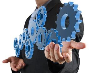 Man holding gears