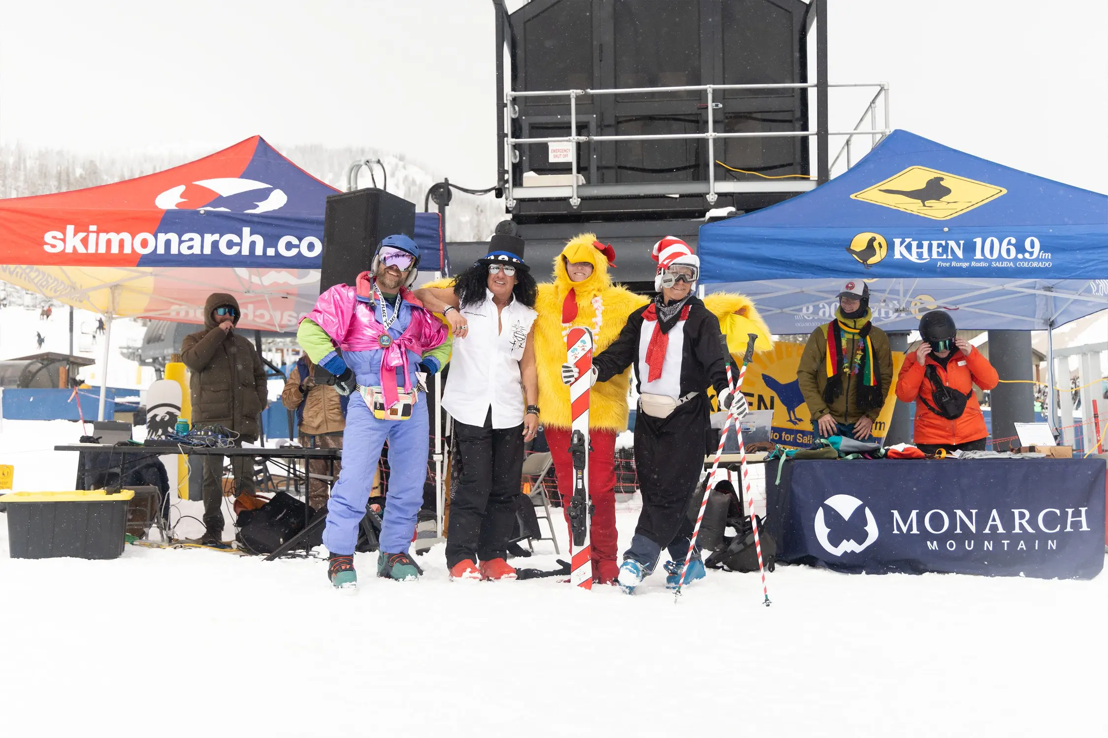The three top performers from the first annual “Ski Ballet on Freeway” posing with the KHEN Community Radio chicken. Photo: Chase McCleary, Rocky Mountain PBS