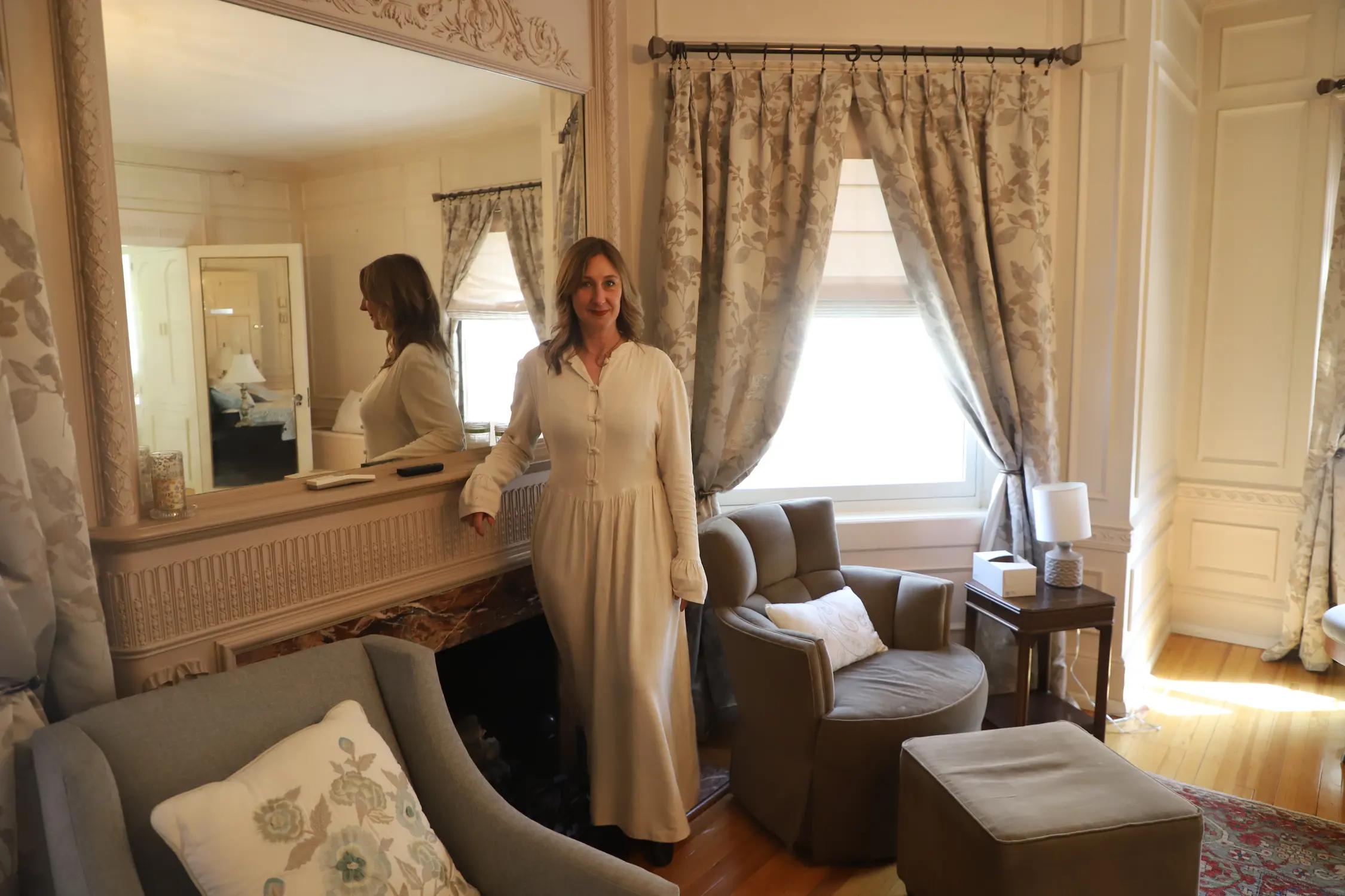 Carrie Stanton in her future bedroom at the People's Mansion. Stanton will be moving in this month and is hopeful about the co-op painting an optimistic future for housing in Denver. Photo: Alec Berg, Rocky Mountain PBS