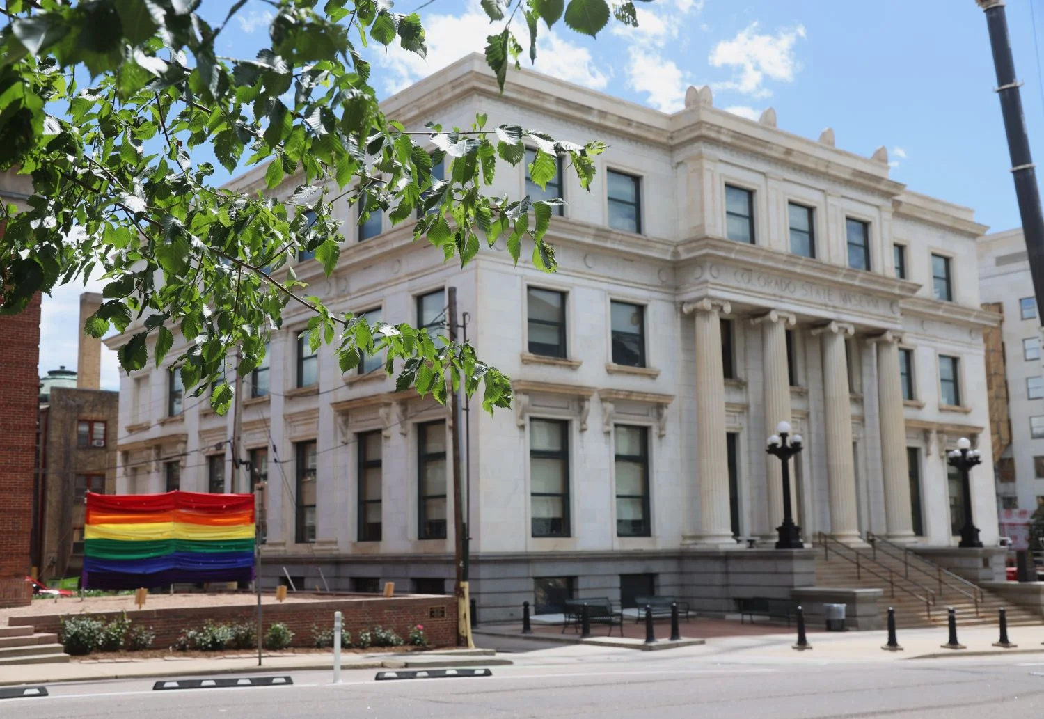 A Pride flag near the Colorado state legislative offices. Colorado recently received a Human Rights Campaign award for its inclusivity toward LGBTQ+ foster parents.  Photo: Elle Naef, Rocky Mountain PBS