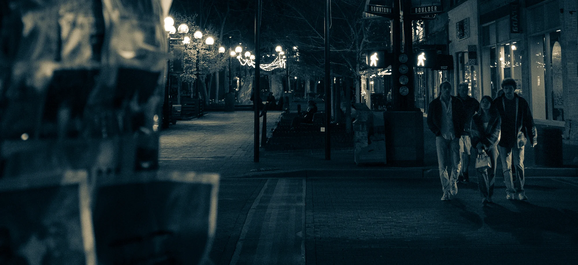 Pedestrians walk down Pearl Street in downtown Boulder. Photo: Cormac McCrimmon, Rocky Mountain PBS