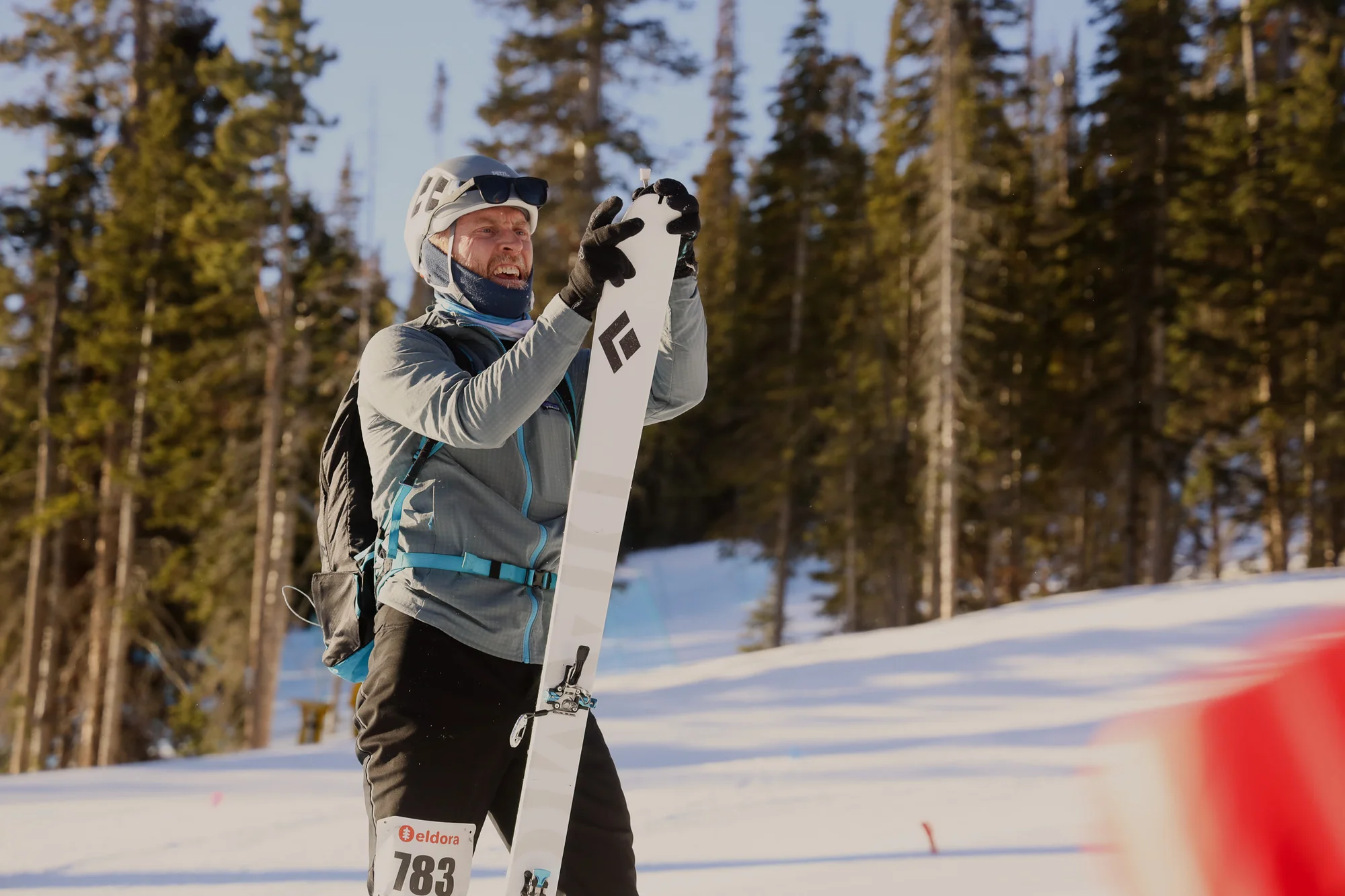 Patrick Ryan attaches his climbing skins to his skis. Photo: Cormac McCrimmon, Rocky Mountain PBS