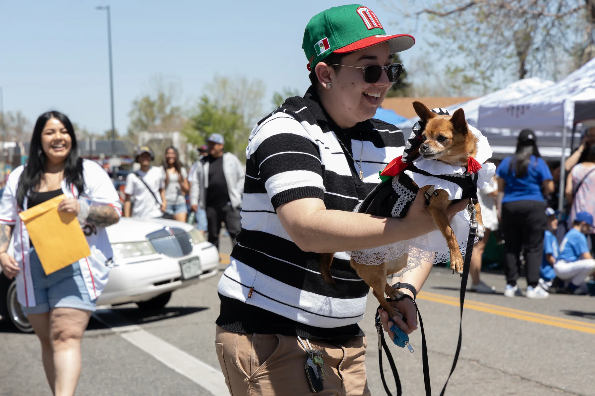 Kareena Romero dances during a mariachi performance with Rosie, a chihuahua. Photo: Carly Rose, Rocky Mountain PBS