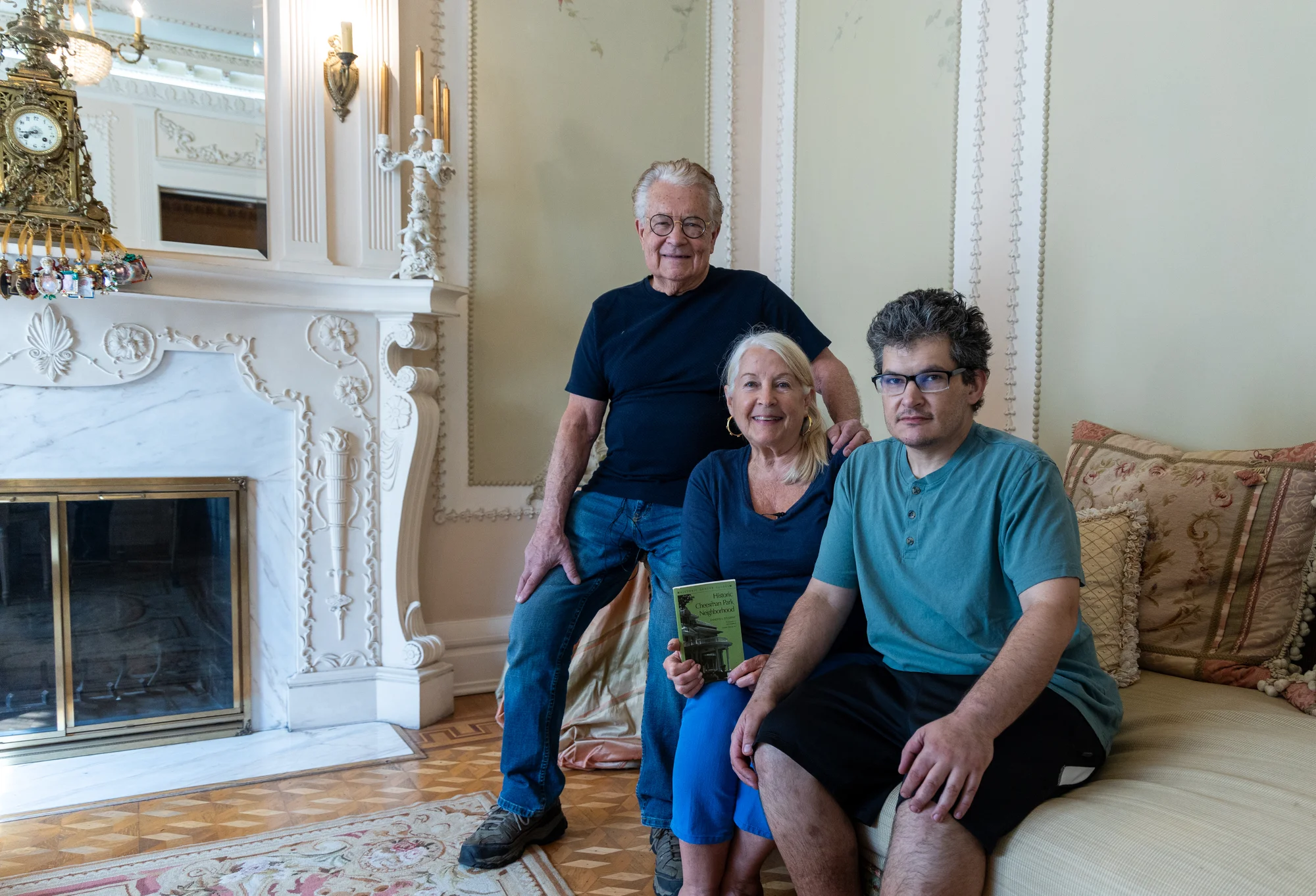 Some of the Reginelli family — Bob, Kathleen and son Christopher — in their parlor room. Photo: Carly Rose, Rocky Mountain PBS