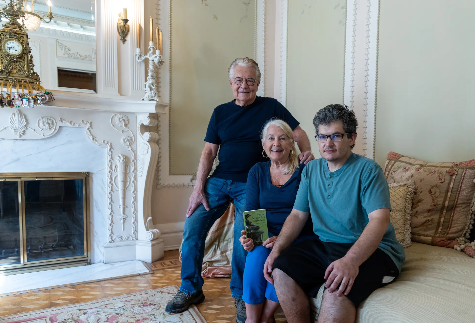 Some of the Reginelli family — Bob, Kathleen and son Christopher — in their parlor room. Photo: Carly Rose, Rocky Mountain PBS