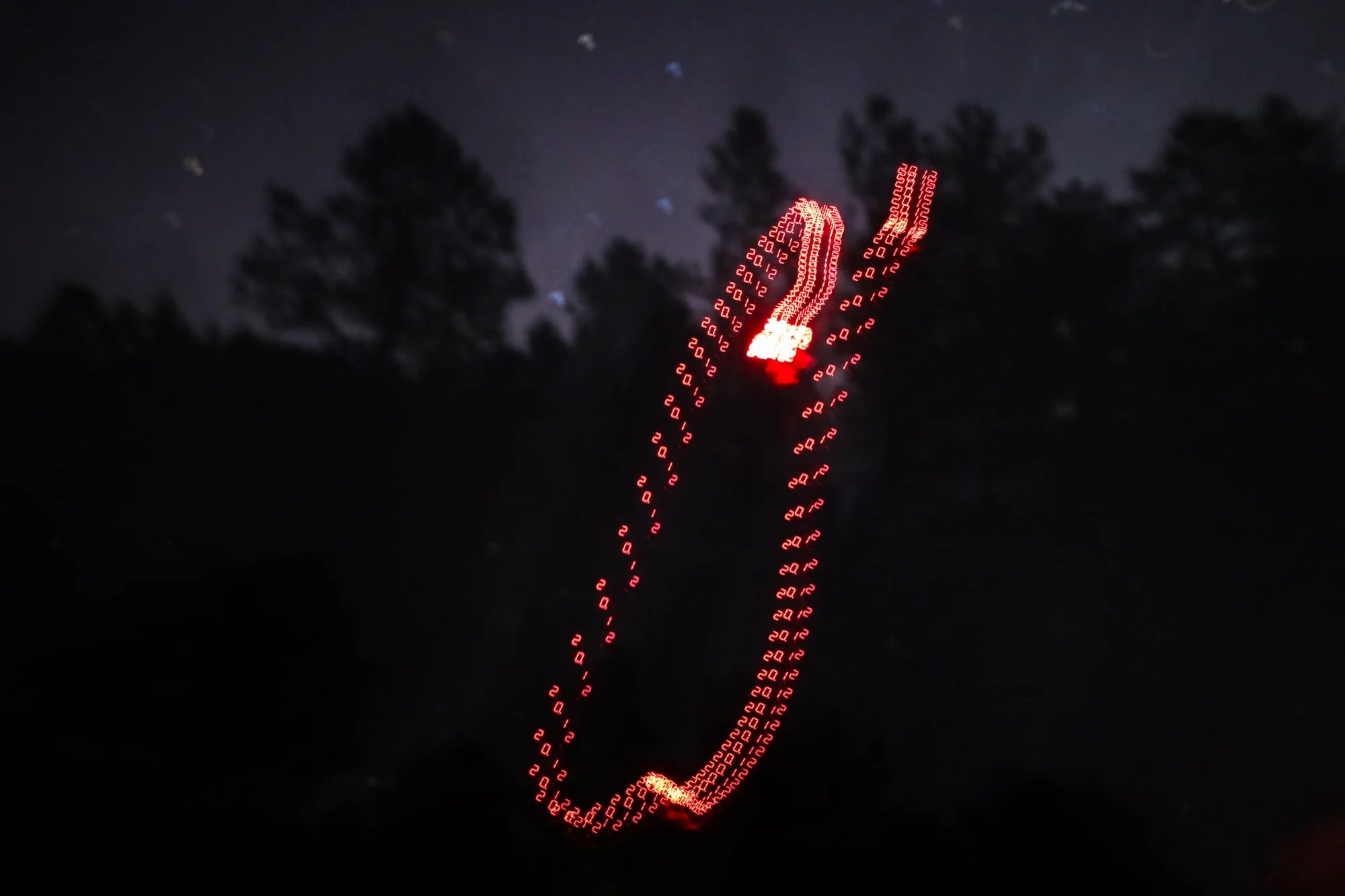 At the Nott Creek trailhead, Phillips held the sensor directly above her head and took six readings. The average reading was 20.1 magnitudes.  Photo, Cormac McCrimmon, Rocky Mountain PBS