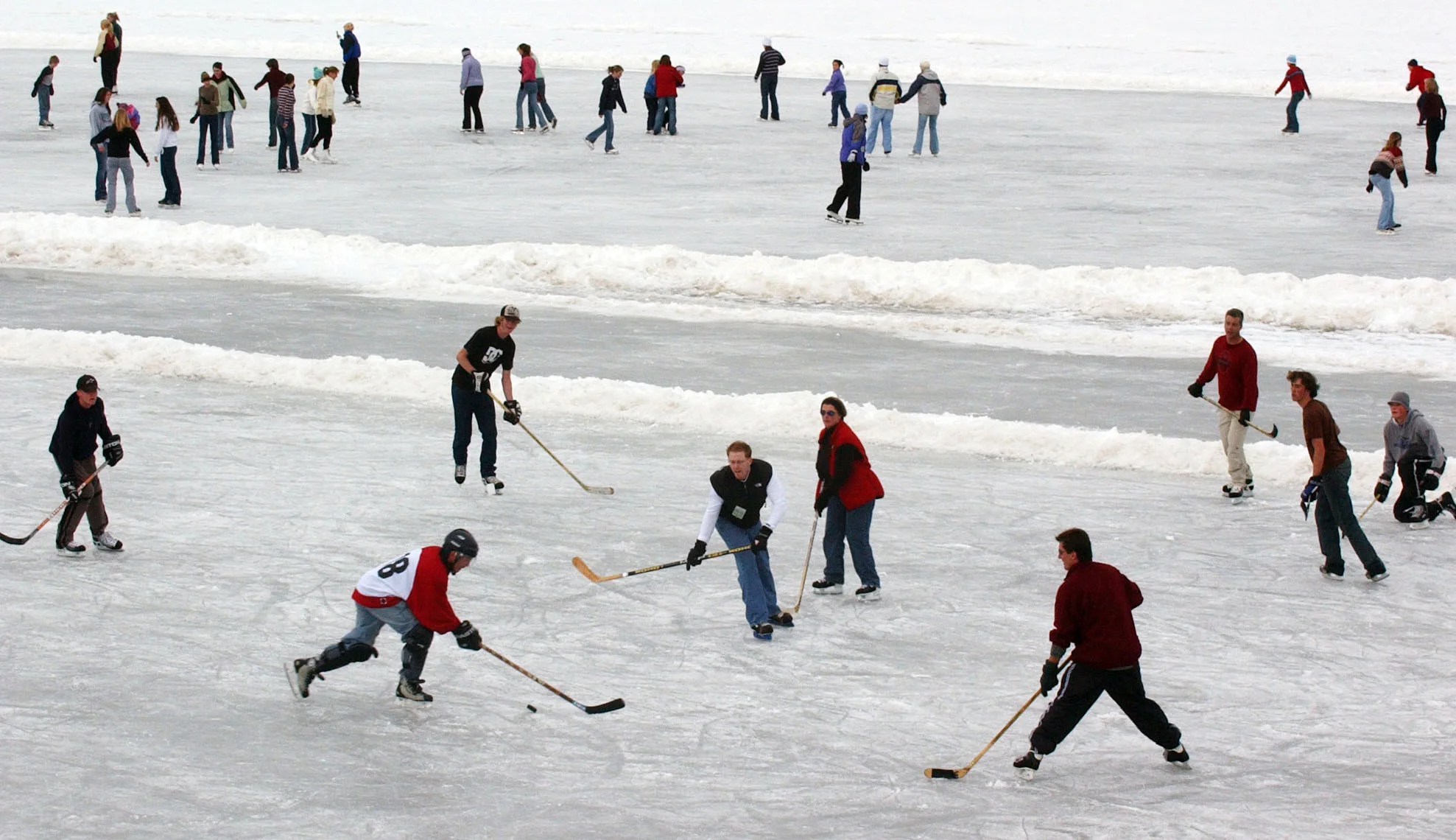 Skaters enjoy a nice day at Evergreen Lake on December 27, 2004. Photo: Ken Papaleo, Rocky Mountain News, courtesy of Denver Public Library Digital Collections