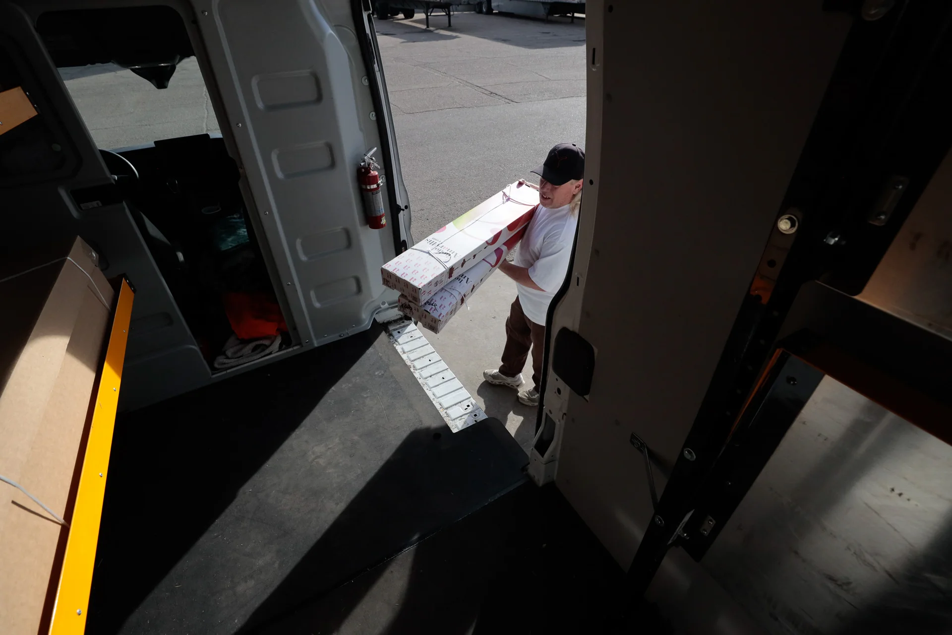 Steve Prather loads a delivery van destined for Aspen. Photo: Cormac McCrimmon, Rocky Mountain PBS
