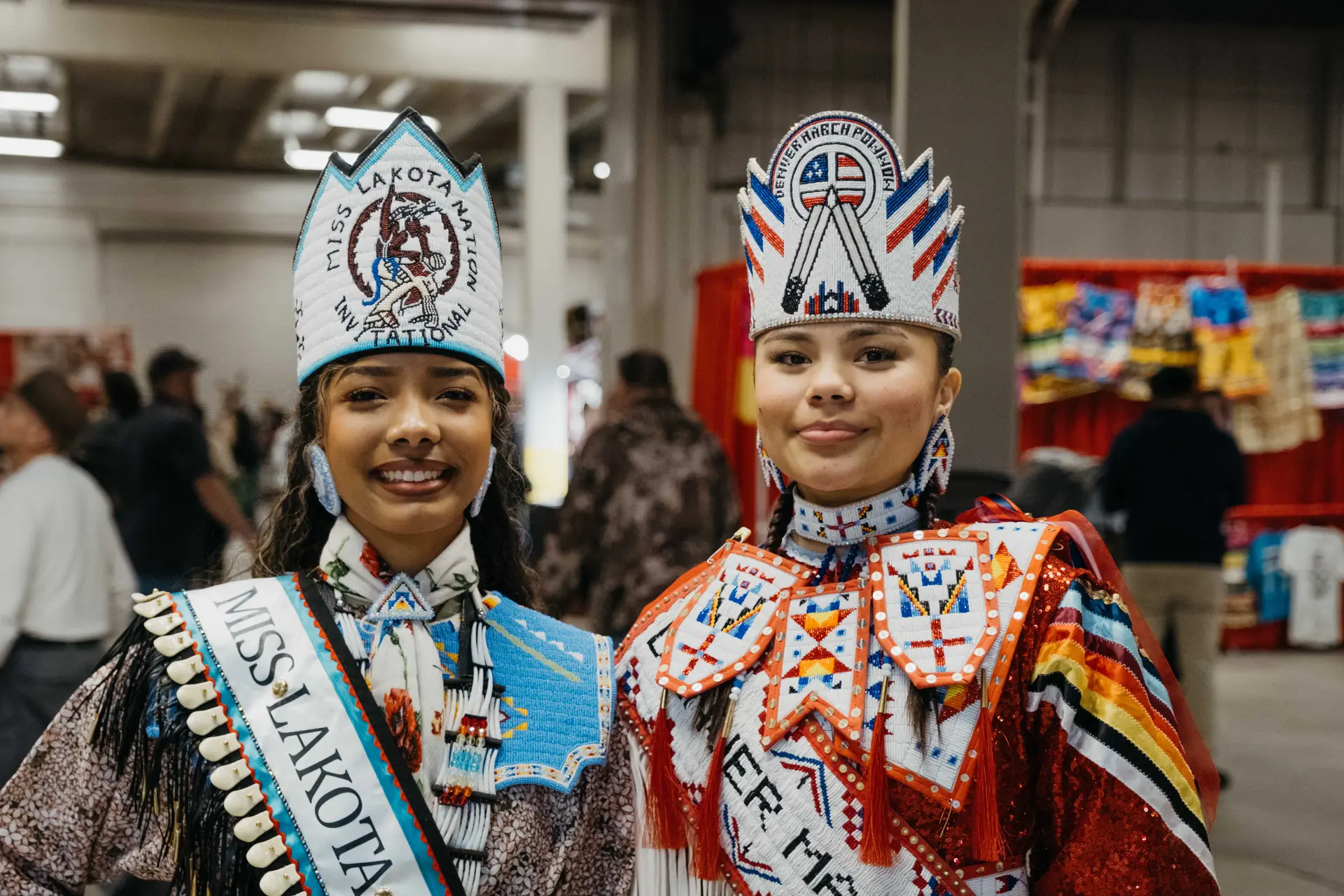 Gabrielle Kenny, left, from the Rosebud Sioux Tribe represented the first-ever Miss Lakota Nation Invitational at the Denver March Powwow. As Miss Denver March Powwow Princess, Meah Little Sky, right, represented the event itself. Little Sky is enrolled in the Mandan and Hidatsa and Arikara Tribes. Little Sky wore a jingle dress. Photo: Peter Vo, Rocky Mountain PBS. Photo: Peter Vo, Rocky Mountain PBS