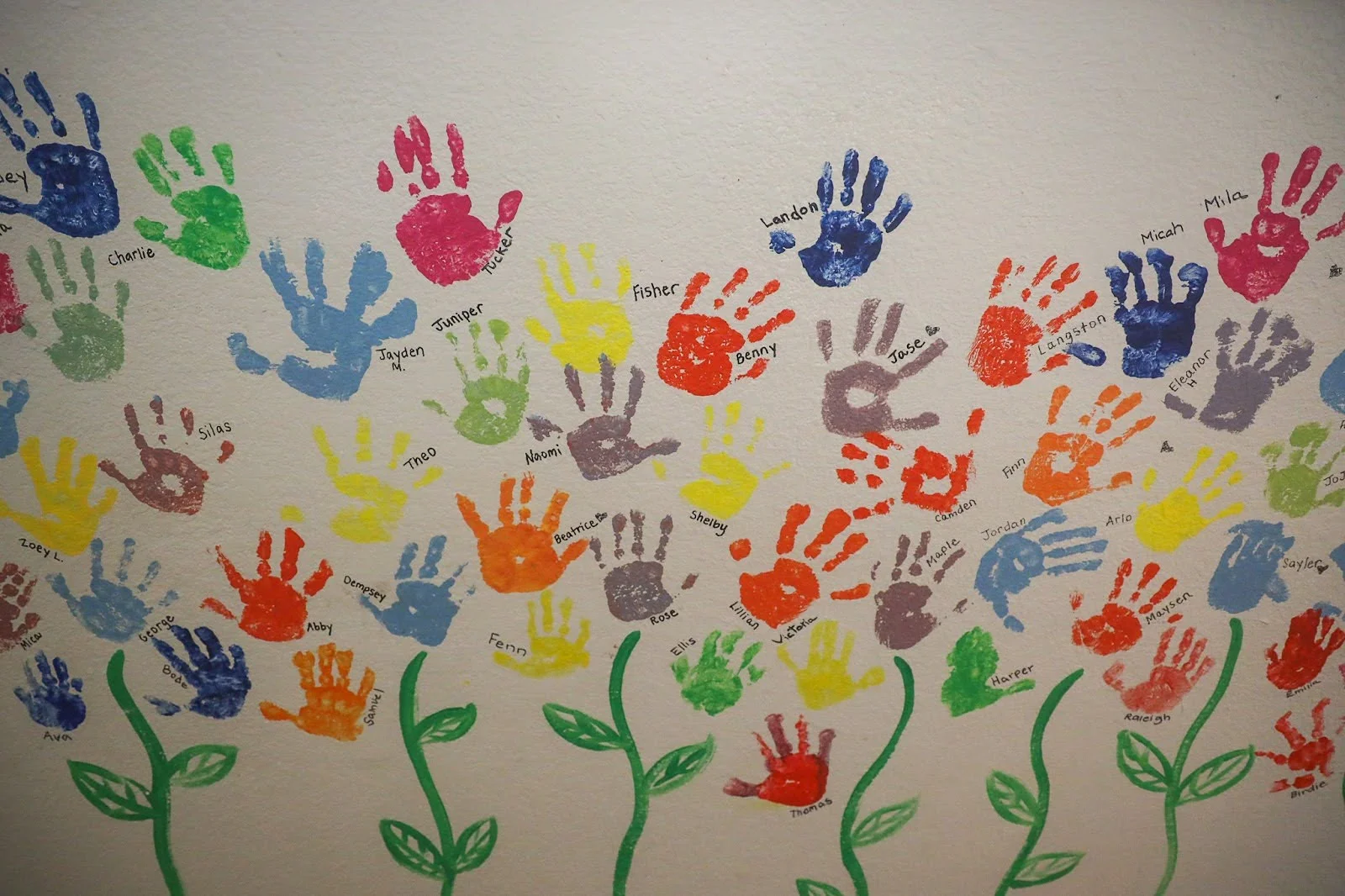 Wall decoration of graduates’ hand print. Photo: Ziyi Xu, Rocky Mountain PBS