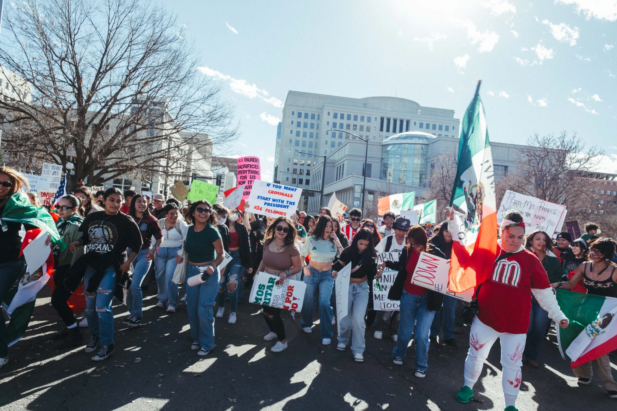 On Feb. 5, 2025, protestors rallied around the Colorado State Capitol in opposition to the Trump administration and recent raids by immigration officers. Photo: Peter Vo, Rocky Mountain PBS