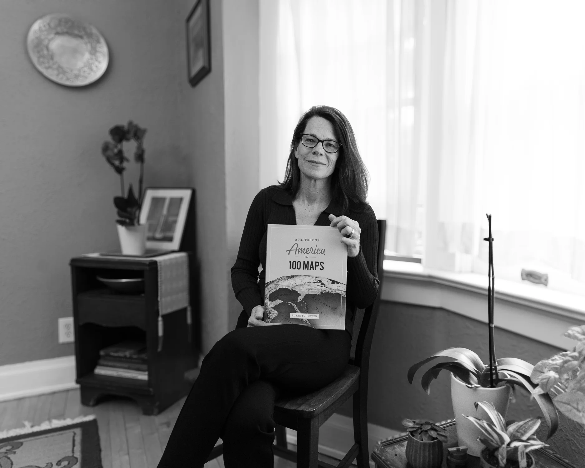 Schulten poses with her book, "A History of America in 100 Maps." Photo: Amanda Horvath, Rocky Mountain PBS