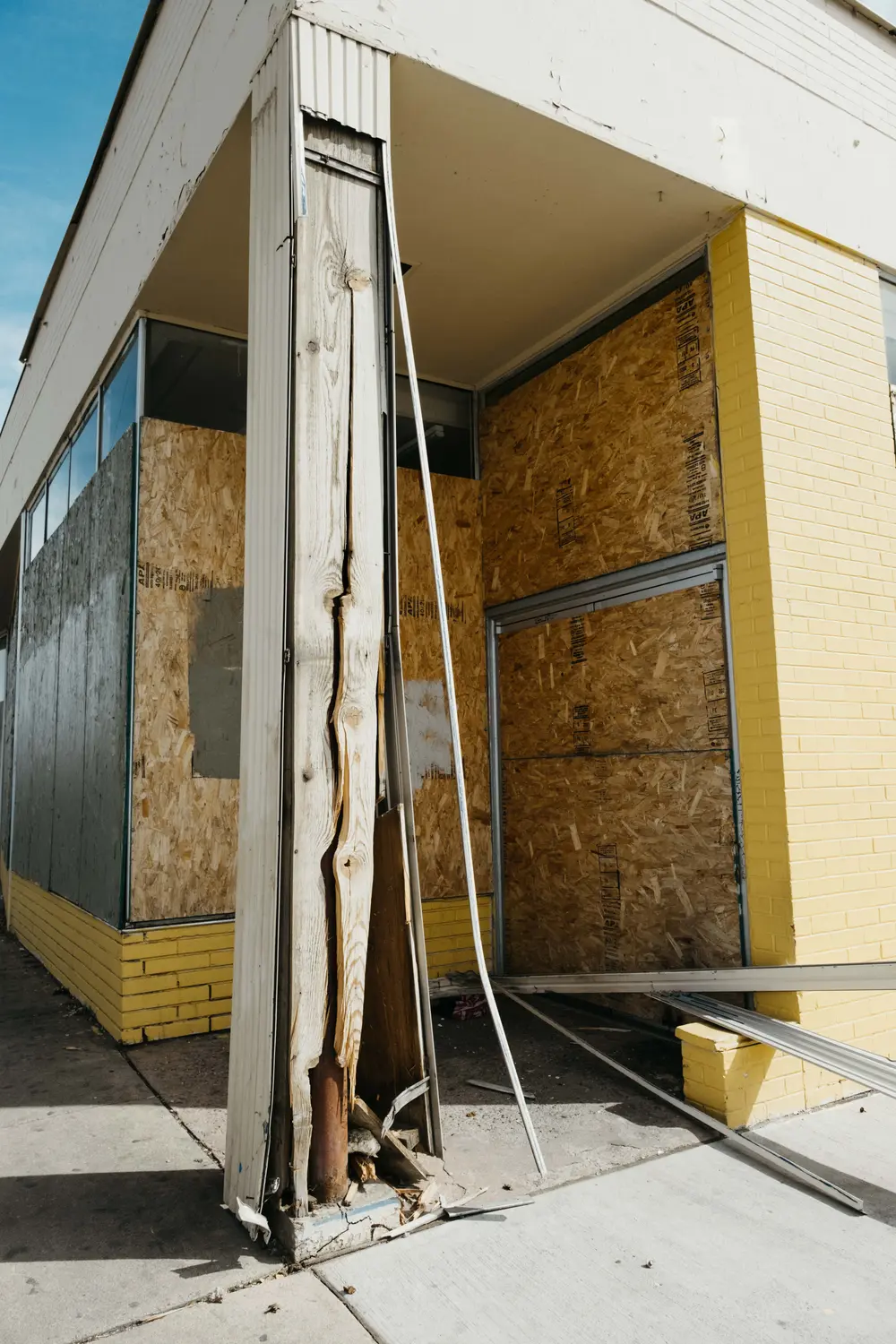 Damaged and boarded-up buildings are scattered throughout Colfax from Aurora to Denver. Photo: Peter Vo, Rocky Mountain PBS