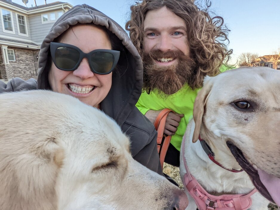 Maureen Maycheco with her family and dogs