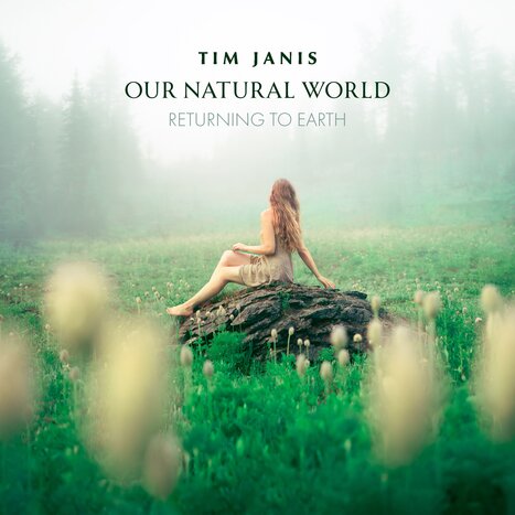 Our Natural World CD Cover, a woman sitting on a rock in a clearing in a forest