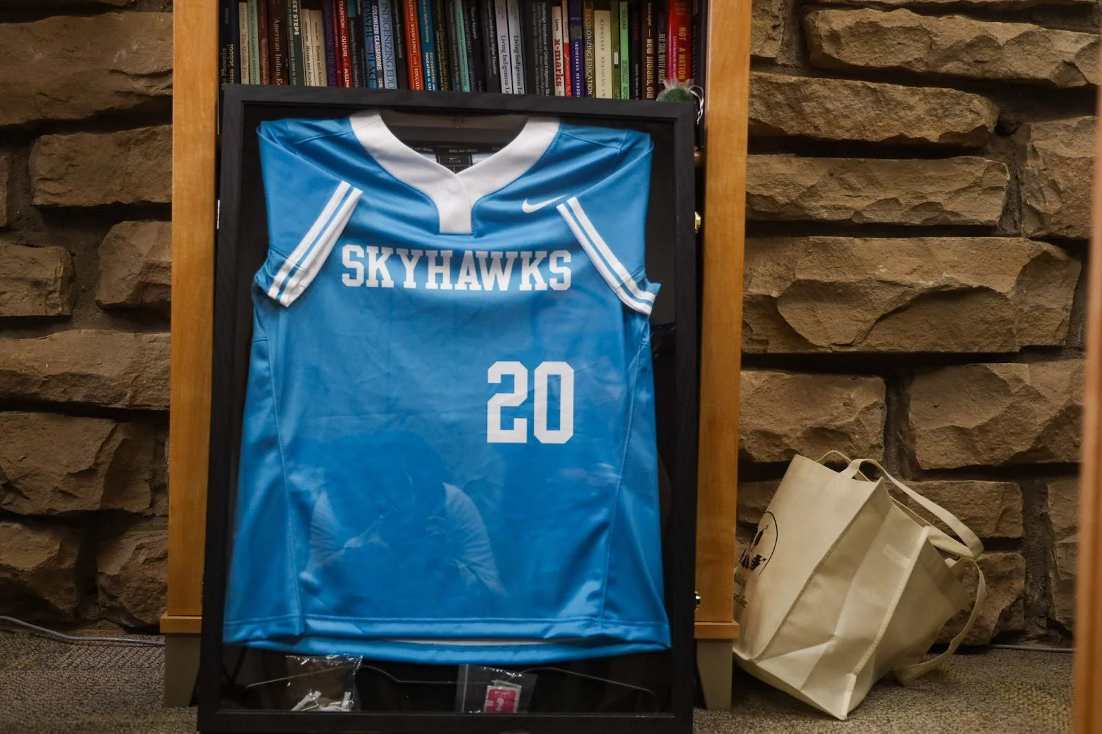 Shotton received a Fort Lewis College Skyhawks jersey as a gift. Photo: Ziyi Xu, Rocky Mountain PBS