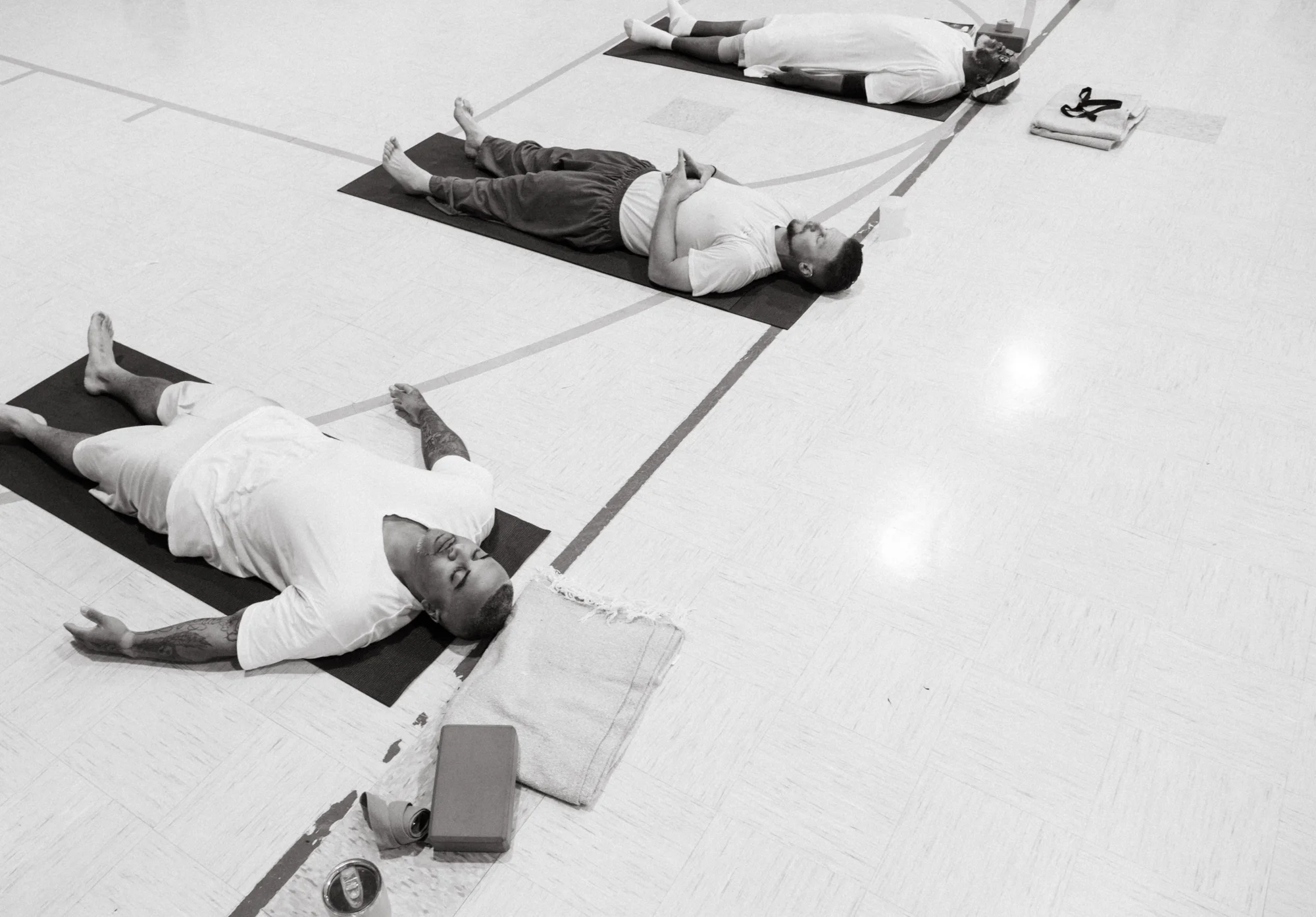 Andrew Hurtado (left) is about halfway through the instructor certification course. He said he does yoga every day, even when he doesn’t have class, because he enjoys the mindfulness and recuperation of the practice. Photo: Peter Vo, Rocky Mountain PBS