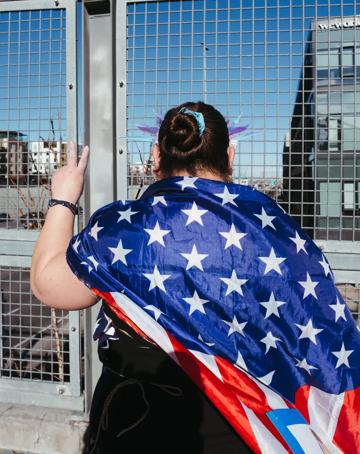 Marissa Garcia prefers to go by 'Lady Justice' at the protests. Photo: Peter Vo, Rocky Mountain PBS