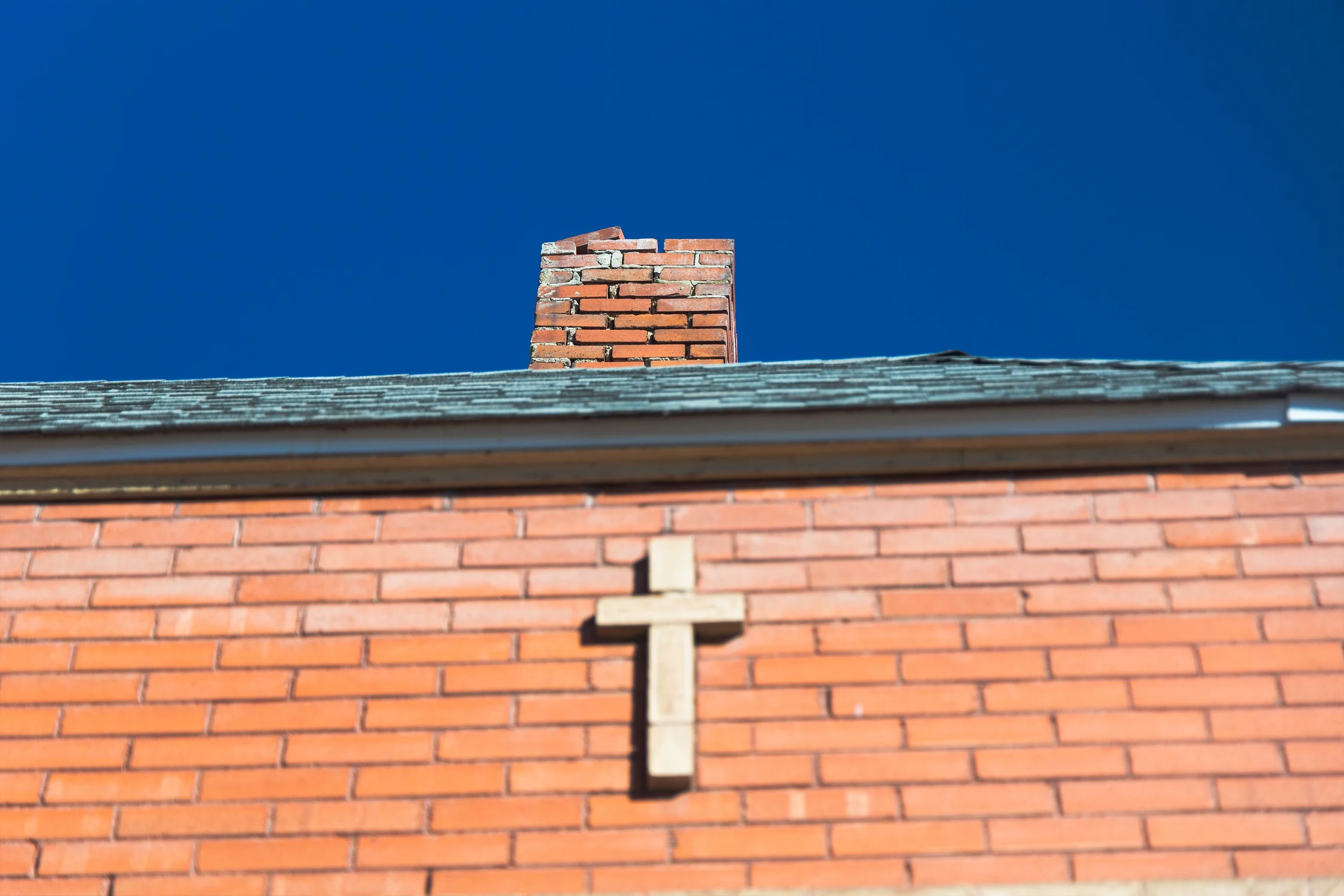 Bricks are falling off of the building’s original chimney, just one of the improvements the church will tackle through a  State Historical Fund grant. Photo: Chase McCleary, Rocky Mountain PBS