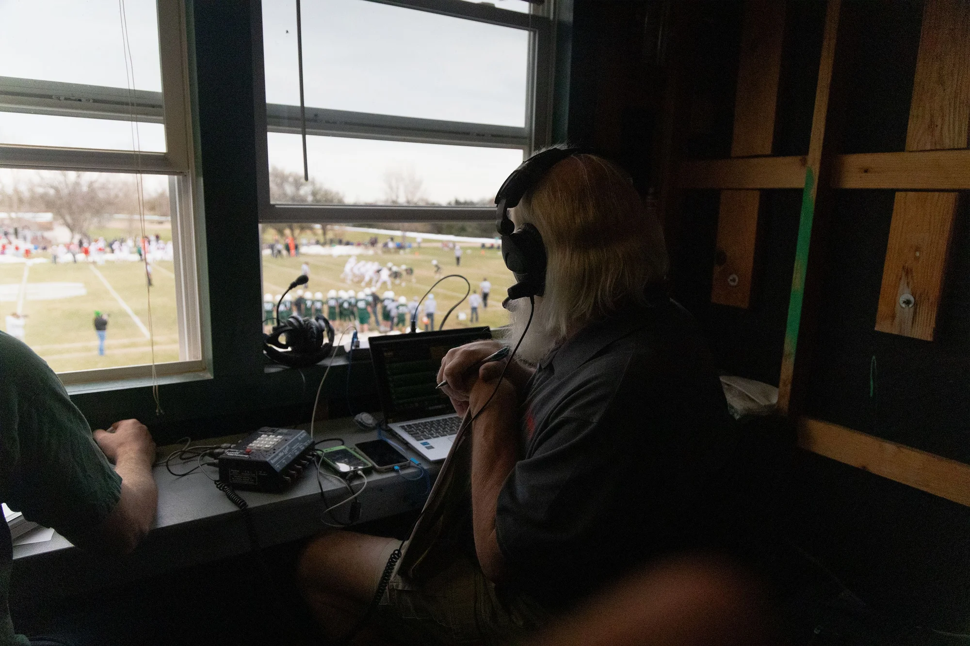 Sherman broadcasted the Stratton-Otis semifinal from the press box overlooking the field.  Photo: Chase McCleary, Rocky Mountain PBS