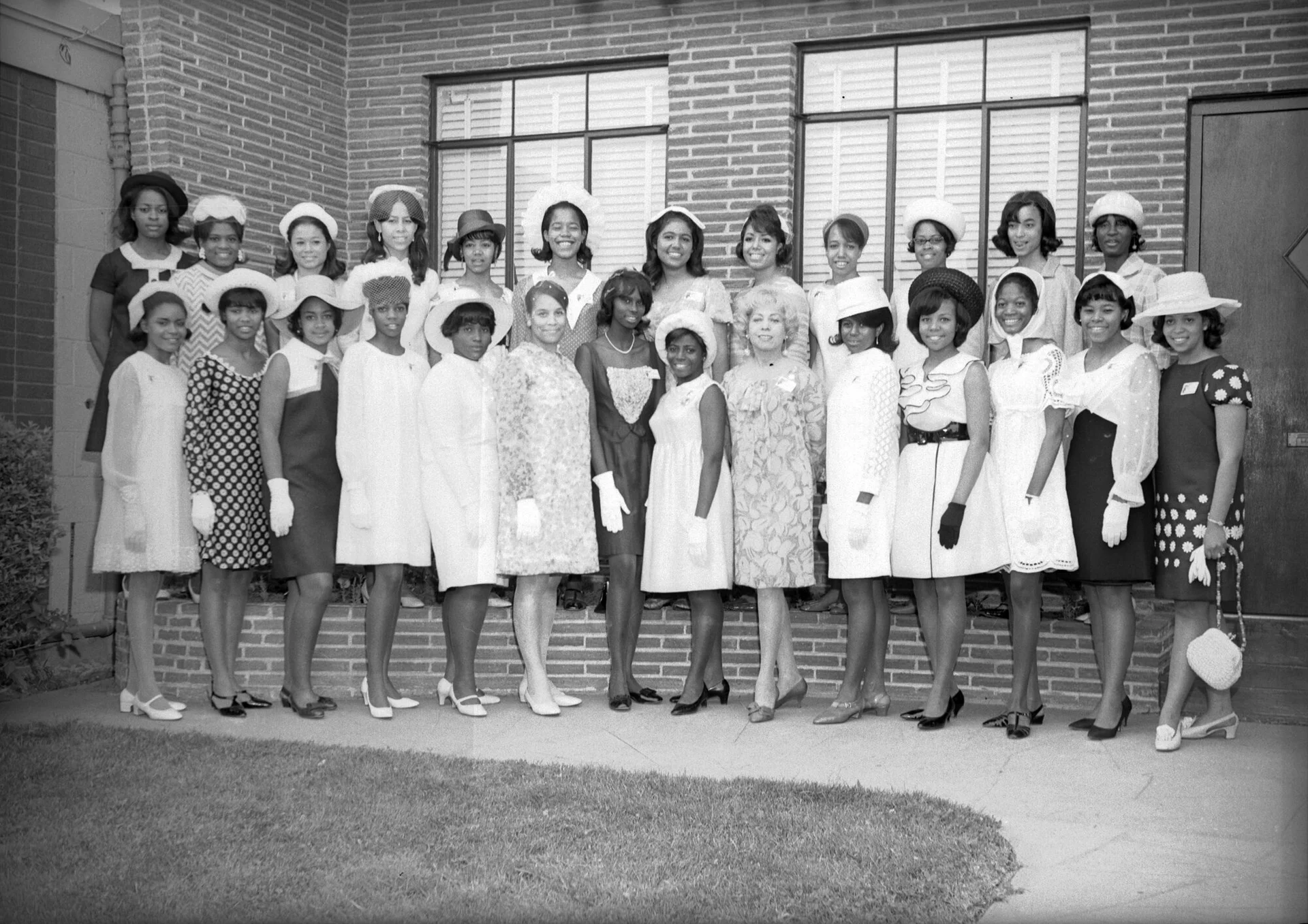 Debutantes attend the annual Owlette Tea. Ernestine Smith stands near the center. She choreographed the “Waltz of the Bells” which has been performed at the Owl Club’s debutante ball since 1952. Photo courtesy Denver Public Library Digital Collections