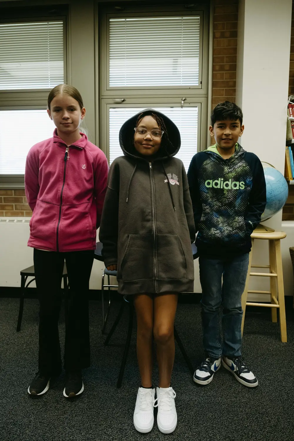 From left to right: Cora Moore, Brooklynn Muhall, and Liam Raudalez pose for portraits. They’re all 5th graders. Photo: Peter Vo, Rocky Mountain PBS