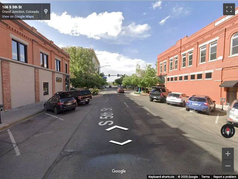 This street view photo from 2021 shows 5th Street with two lanes and diagonal parking on either side. Image courtesy Google Maps.
