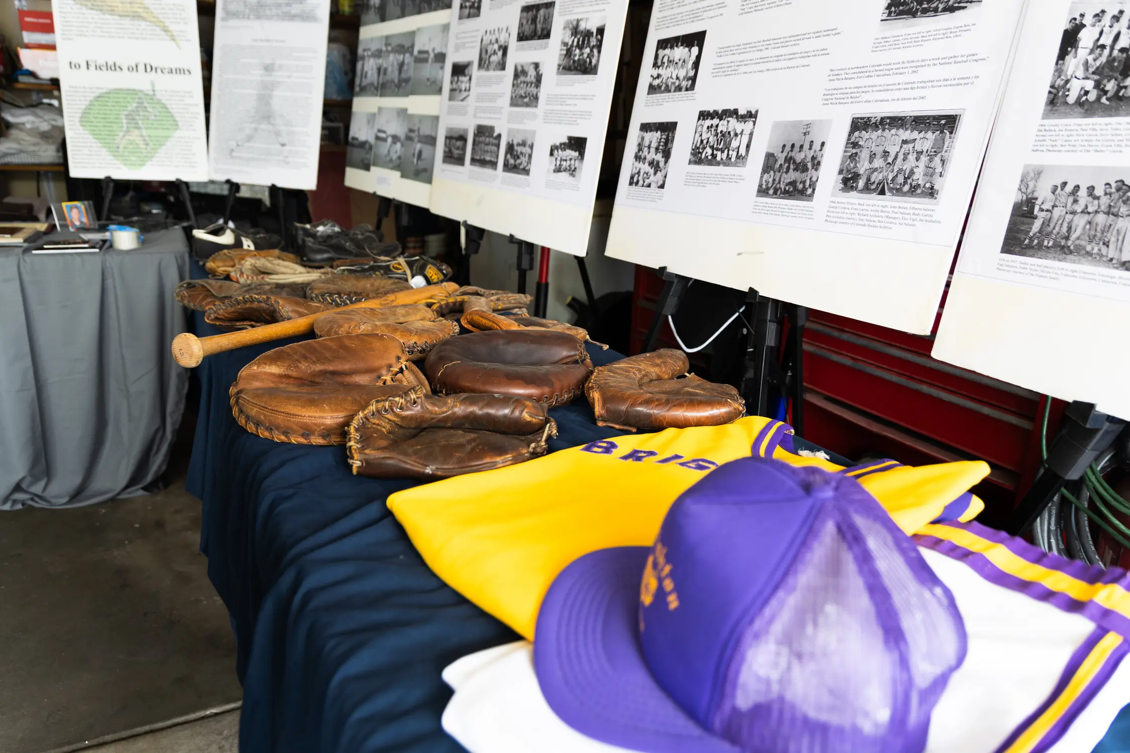 Some of the artifacts and photographs Gabriel and Jody Lopez have collected about baseball in northern Colorado. Photo: Amanda Horvath, Rocky Mountain PBS