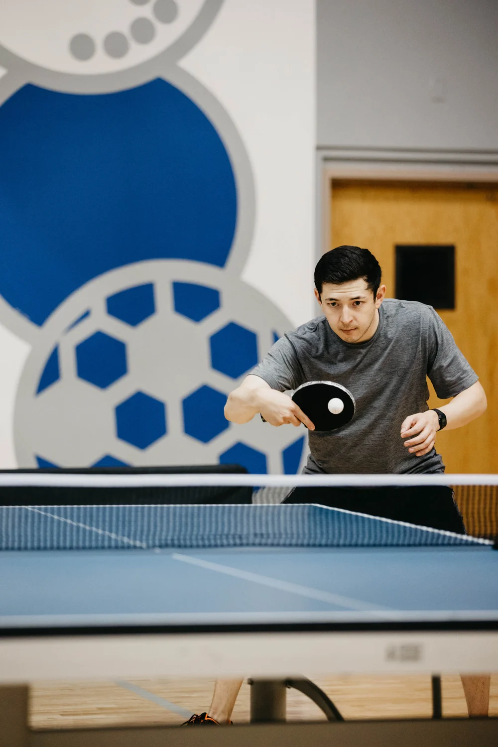 Preiss’ son, Austin, started playing table tennis when he was three years old. Austin Preiss performs in table tennis exhibitions with his father. Photo: Peter Vo, Rocky Mountain PBS