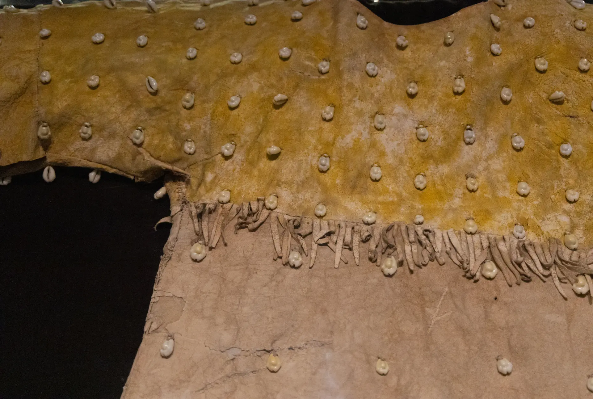The shape of dresses made out of animal hide were dependent on the shape of the animal. Two of the animal’s legs become the sleeves, and the other two hang slightly at the bottom of the dress. This creates an upside down-U shape on the hem line. Photo: Carly Rose, Rocky Mountain PBS