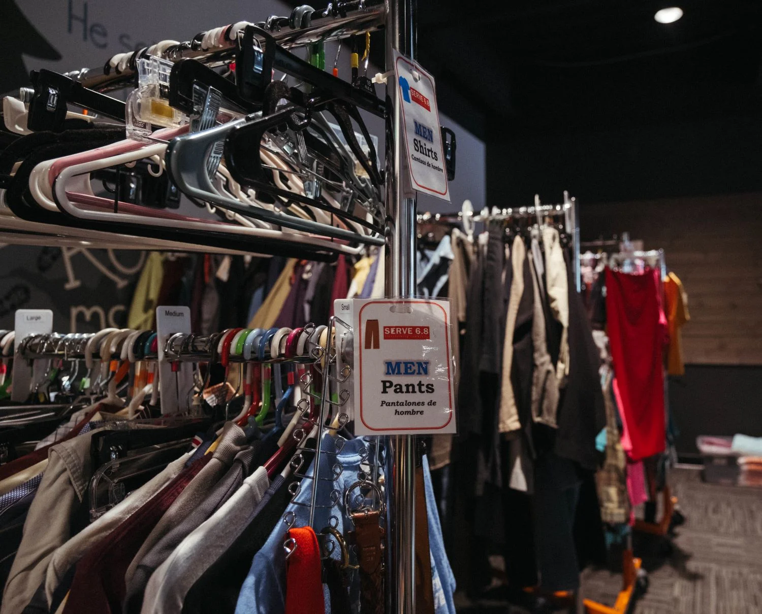 Donated clothes that filled rooms at the church. Photo: Peter Vo, Rocky Mountain PBS