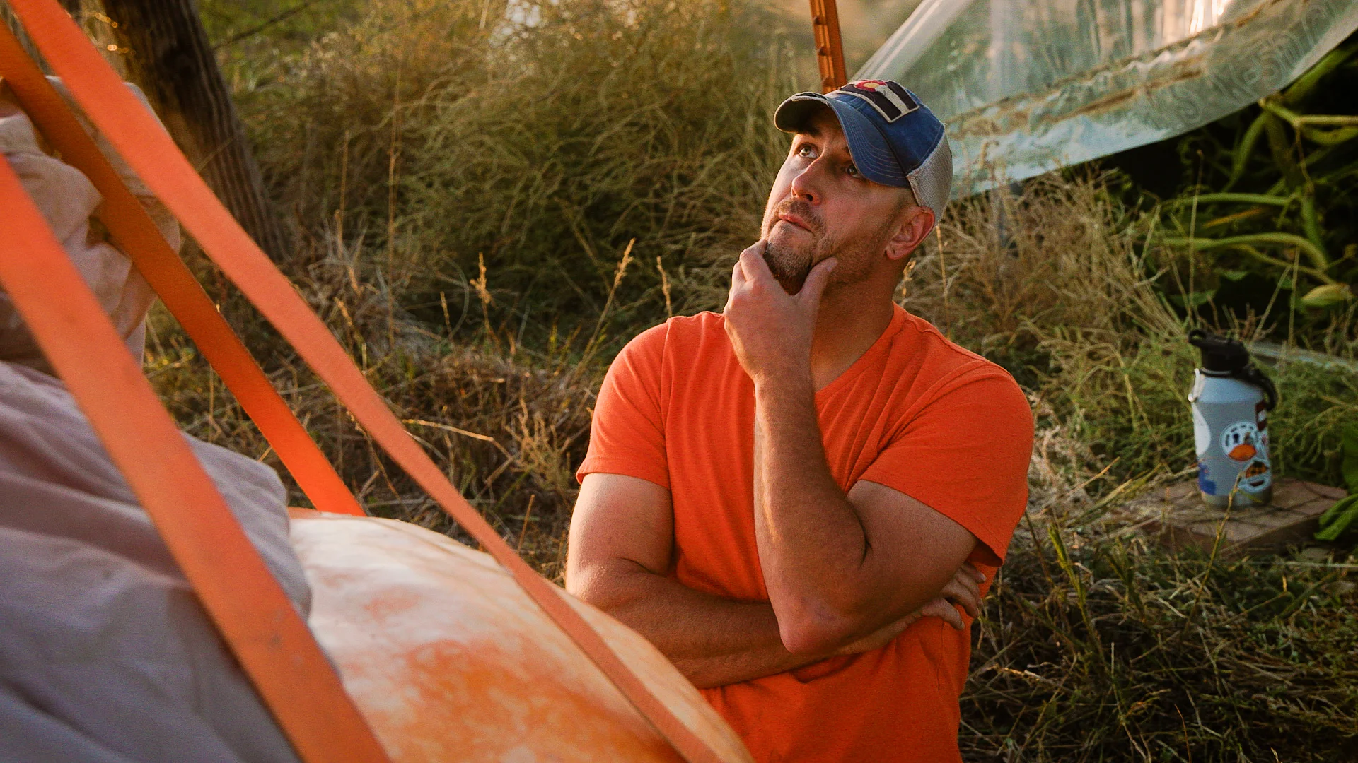 Bledsoe waits in anticipation to see the weight of his second of three competition pumpkins. Photo: Cormac McCrimmon, Rocky Mountain PBS