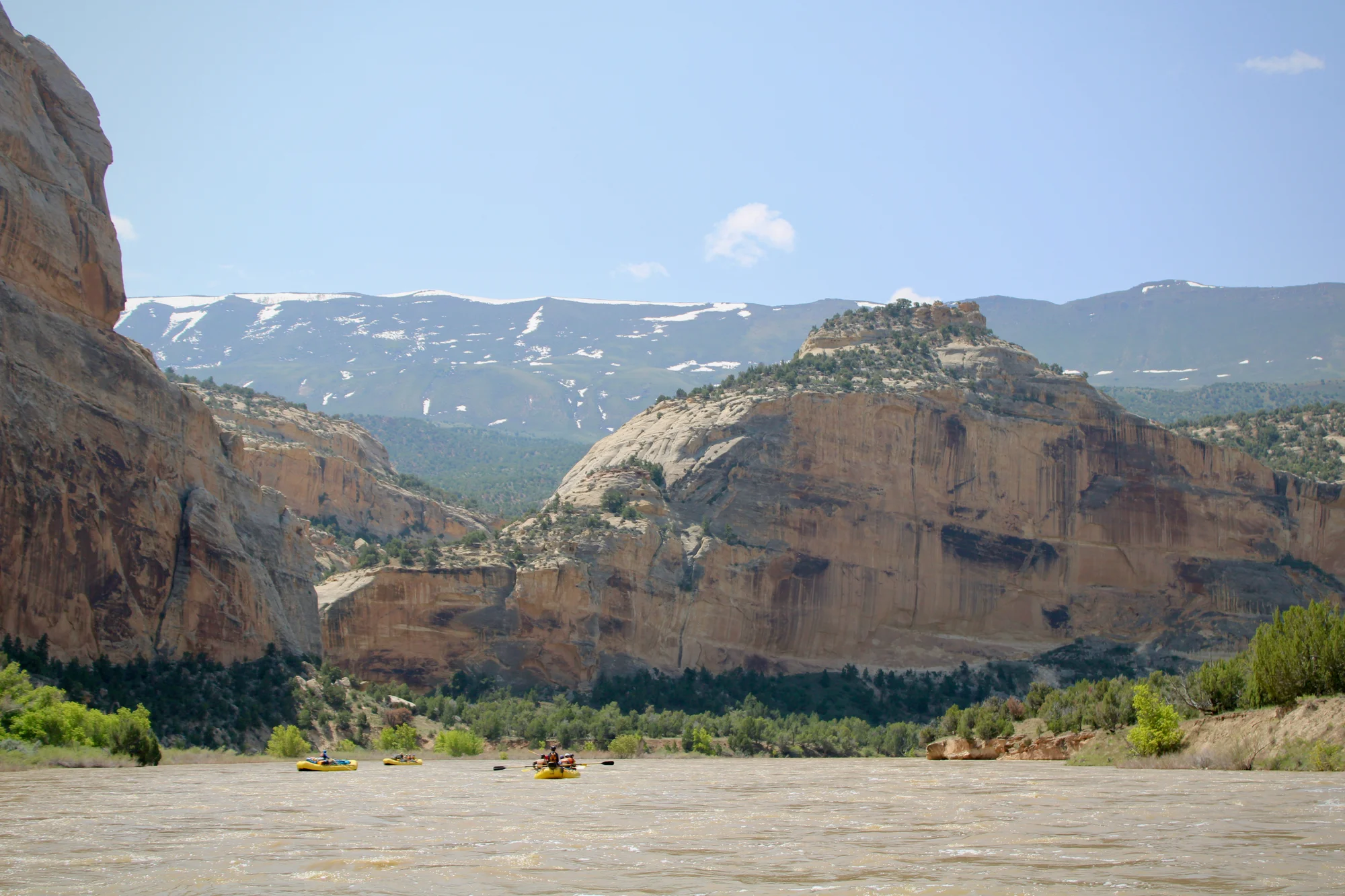 The Yampa River flows through northwest Colorado after an unusually snowy winter on May 21, 2023. As climate change and steady demand have shrunk water supplies in the Colorado River system, scientists have worked to produce increasingly granular data about that mountain snow and how it melts. Photo: Alex Hager, KUNC