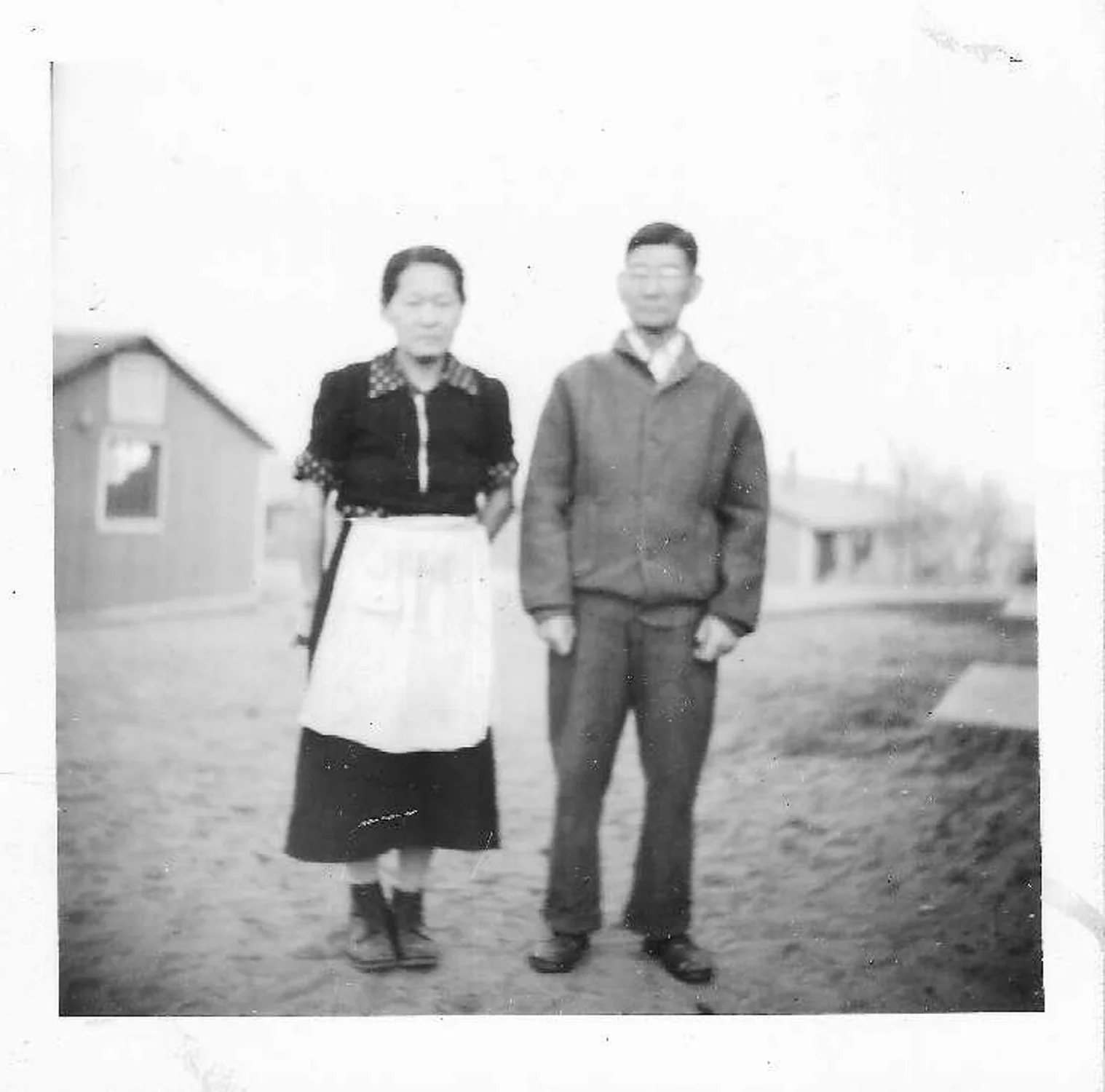 Scott Goto’s great grandparents at Amache. Matsu Okubo (on left) and Kiyoji Okubo (on right). Matsu is in an apron. She was a cook in the Mess Hall. Photo courtesy Debbe Hamada