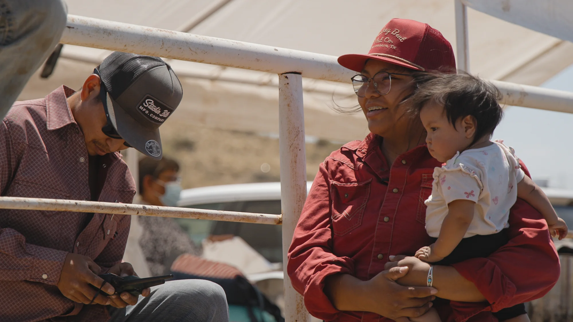 Kristal Puente and her daughter at the arena. Photo: Ziyi Xu, Rocky Mountain PBS
