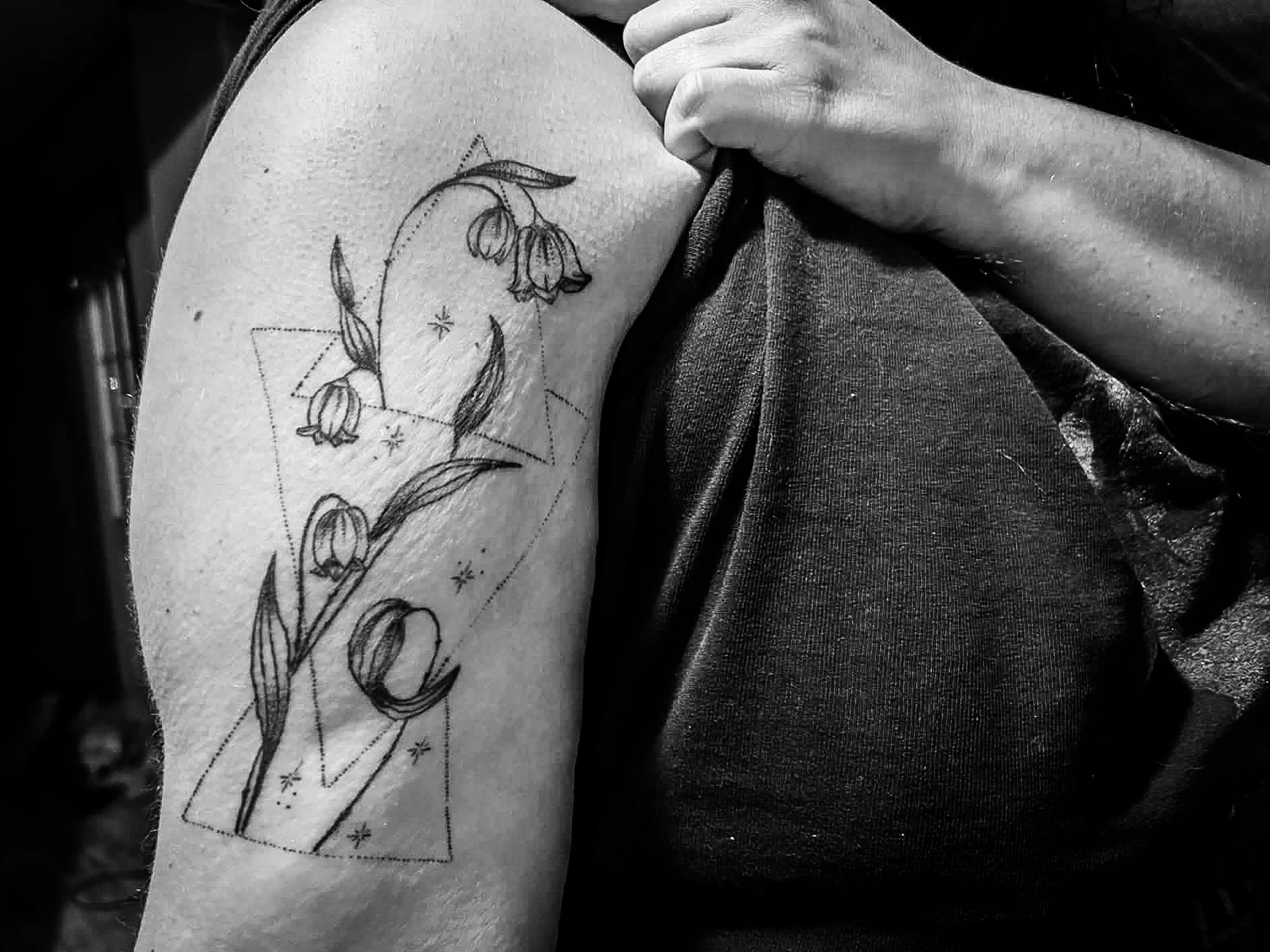 Neaves got a tattoo honoring the pregnancy loss. The due date was supposed to be in May, represented by May’s birth flower, the lily-of-the-valley, and three triangles symbolizing the three months of the pregnancy. Photo courtesy of Aynsley Neaves