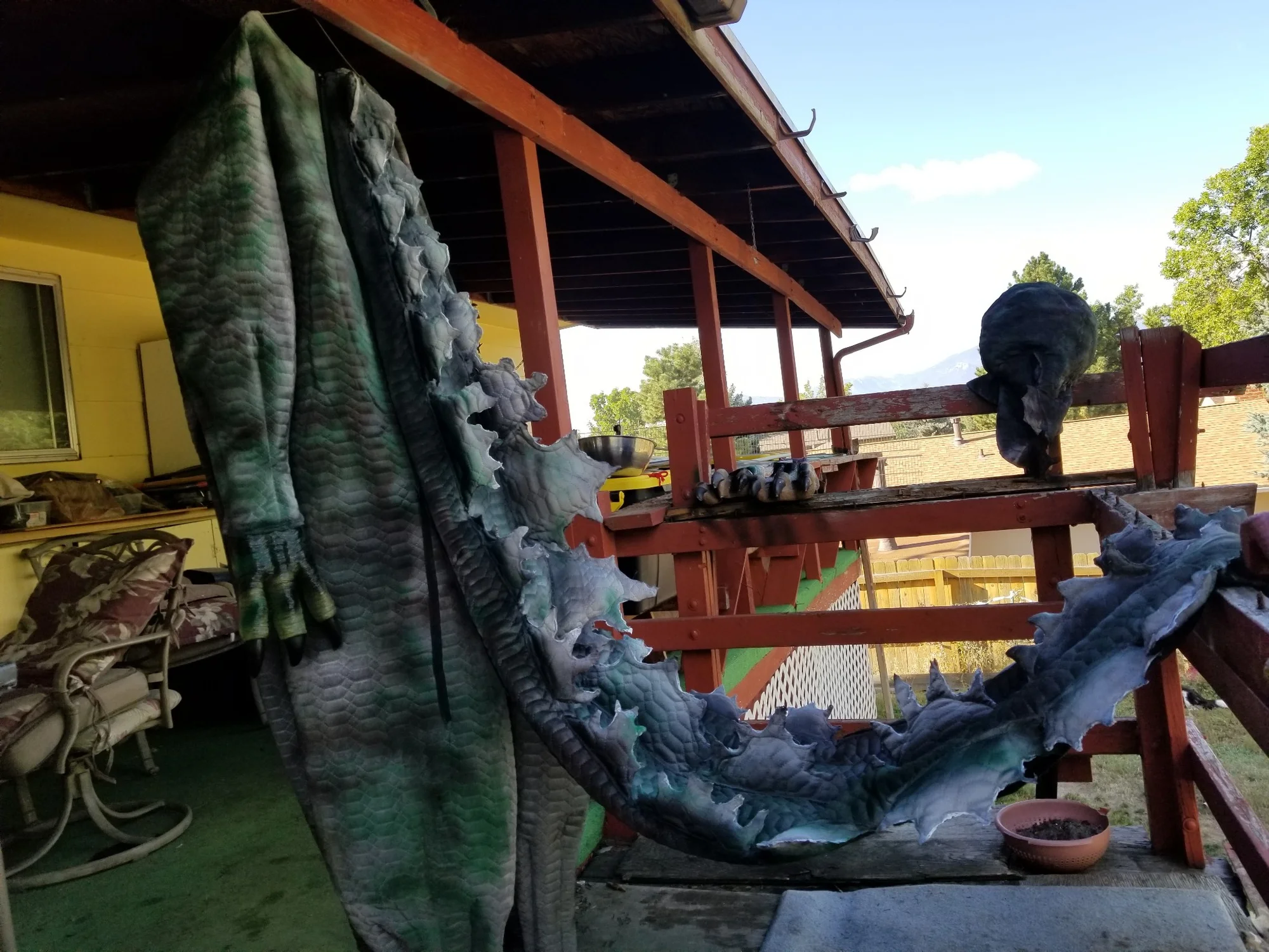 Eva fashioned her Godzilla suit from Walmart bed sheets with a scaly pattern. Photo: Eva Saunders