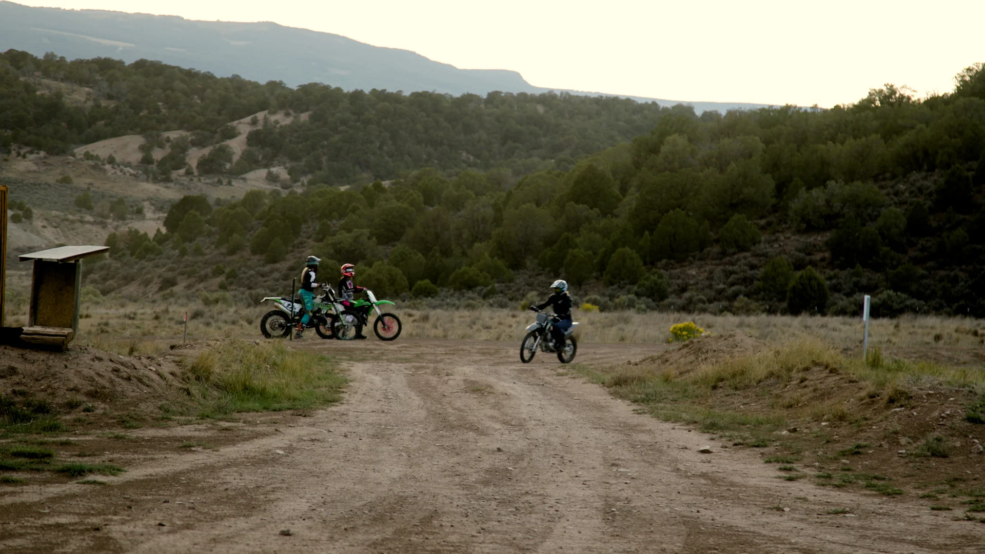 Women congregate on their dirt bikes at Dry Lake MX Park. Photo: Chelsea Casabona, Rocky Mountain PBS