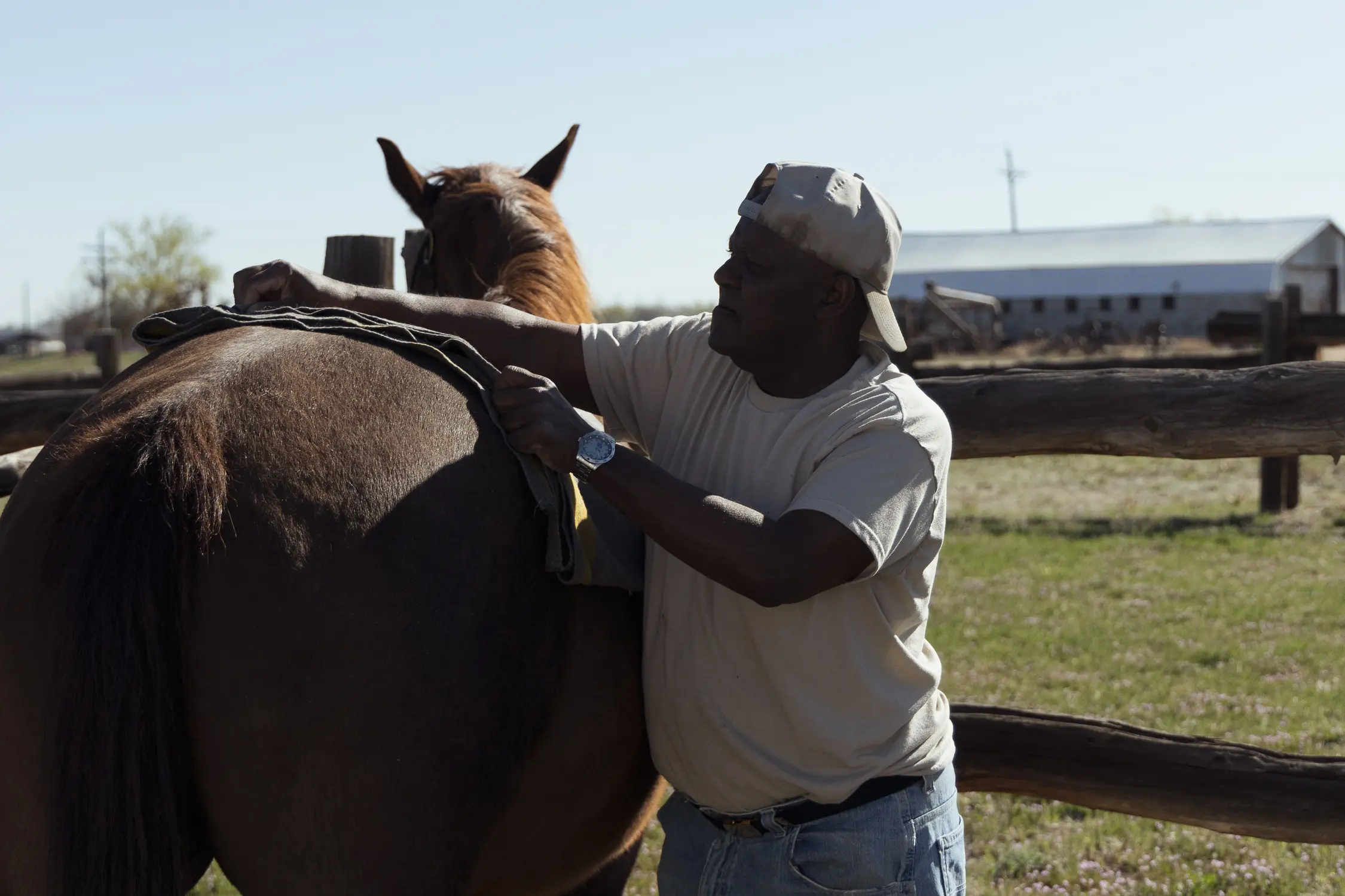 A reenactor with the Buffalo Soldiers of the American West readies his horse for a performance in Fort Lupton, Colorado. Photo: Cormac McCrimmon, Rocky Mountain PBS