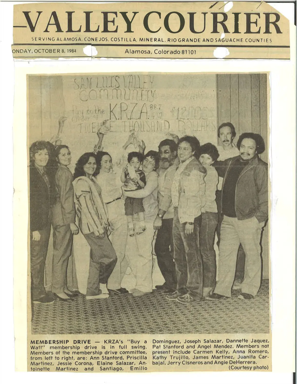 Pat Stanford (second person from the left), at a membership drive for KRZA in October 1984. Photo courtesy Gerald Rodriguez