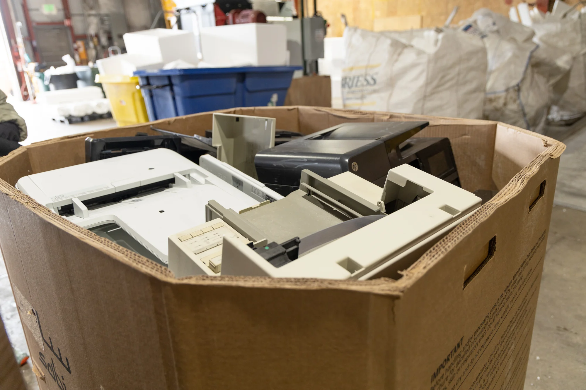 Printers waiting to be shipped at Eco-Cycle’s Center for Hard-to-Recycle Materials. Photo by Andrea Kramar, Rocky Mountain PBS