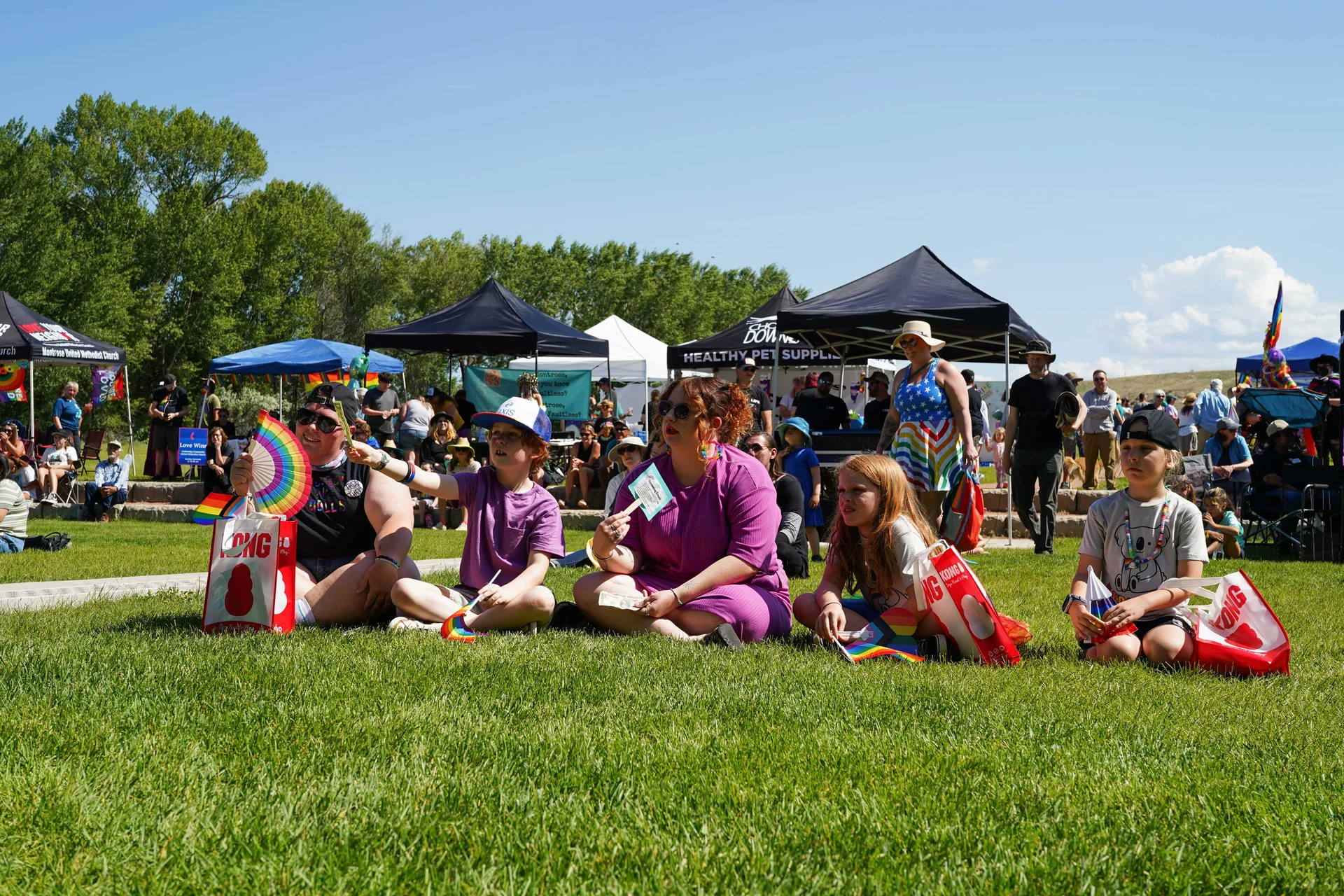 People watch the drag performances at Cerise Park in Montrose on Saturday, June 7. Photo: Joshua Vorse, Rocky Mountain PBS