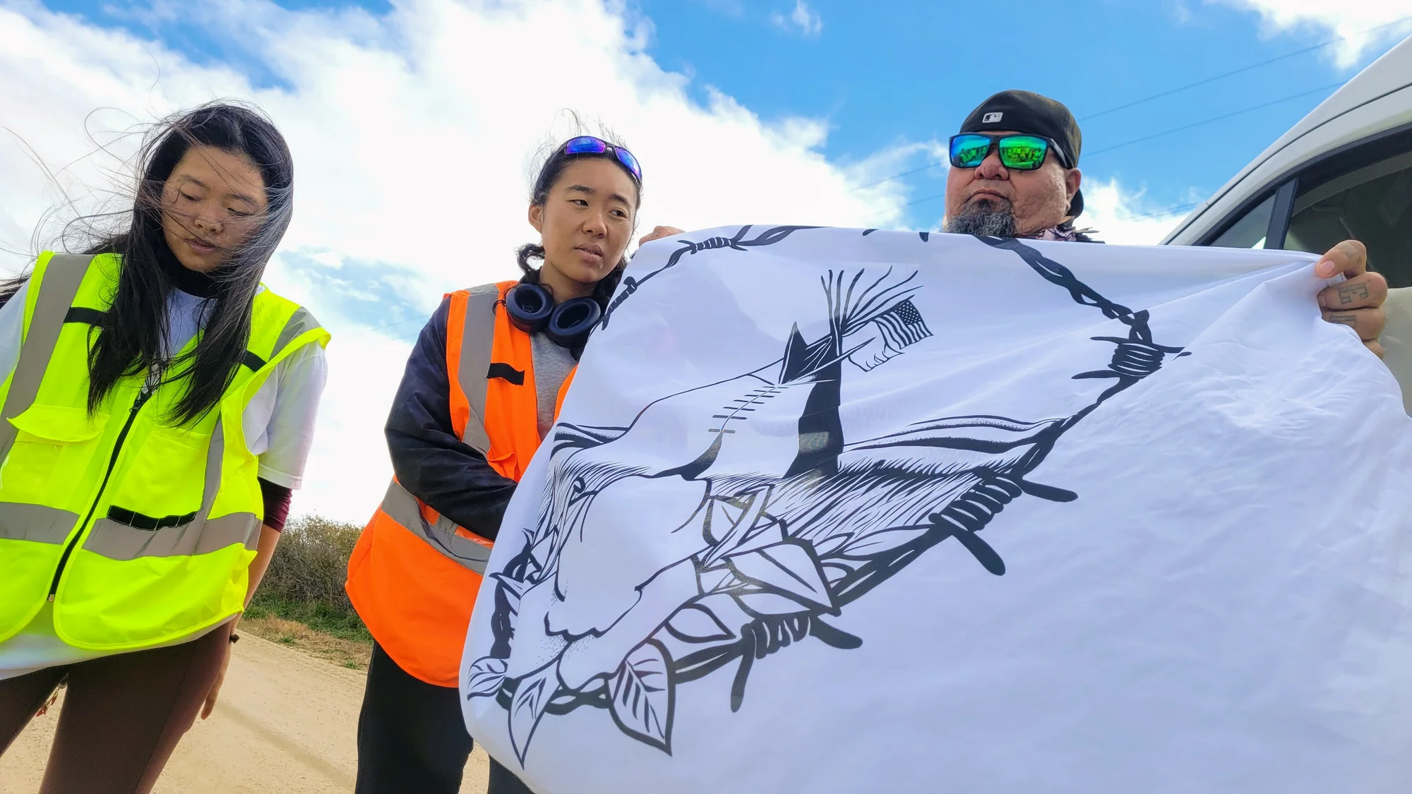 From left, Aya Sugiura, Mariko Fujimoto Rooks and Greg Lamebull take a moment to reflect after finishing the run near Agate, Colo. on October 19, 2024. Photo: Rae Solomon, KUNC