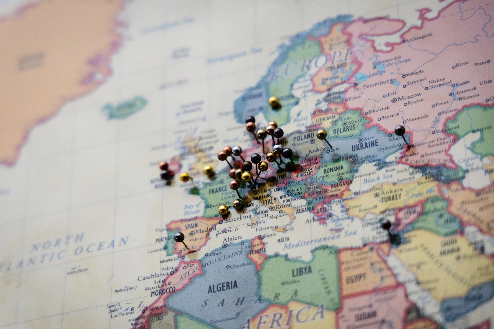 A pin map hanging on the Presbyterian Annex wall illustrates the worldly visitors who pass through the Trail Hiker Center. Photo: Chase McCleary, Rocky Mountain PBS