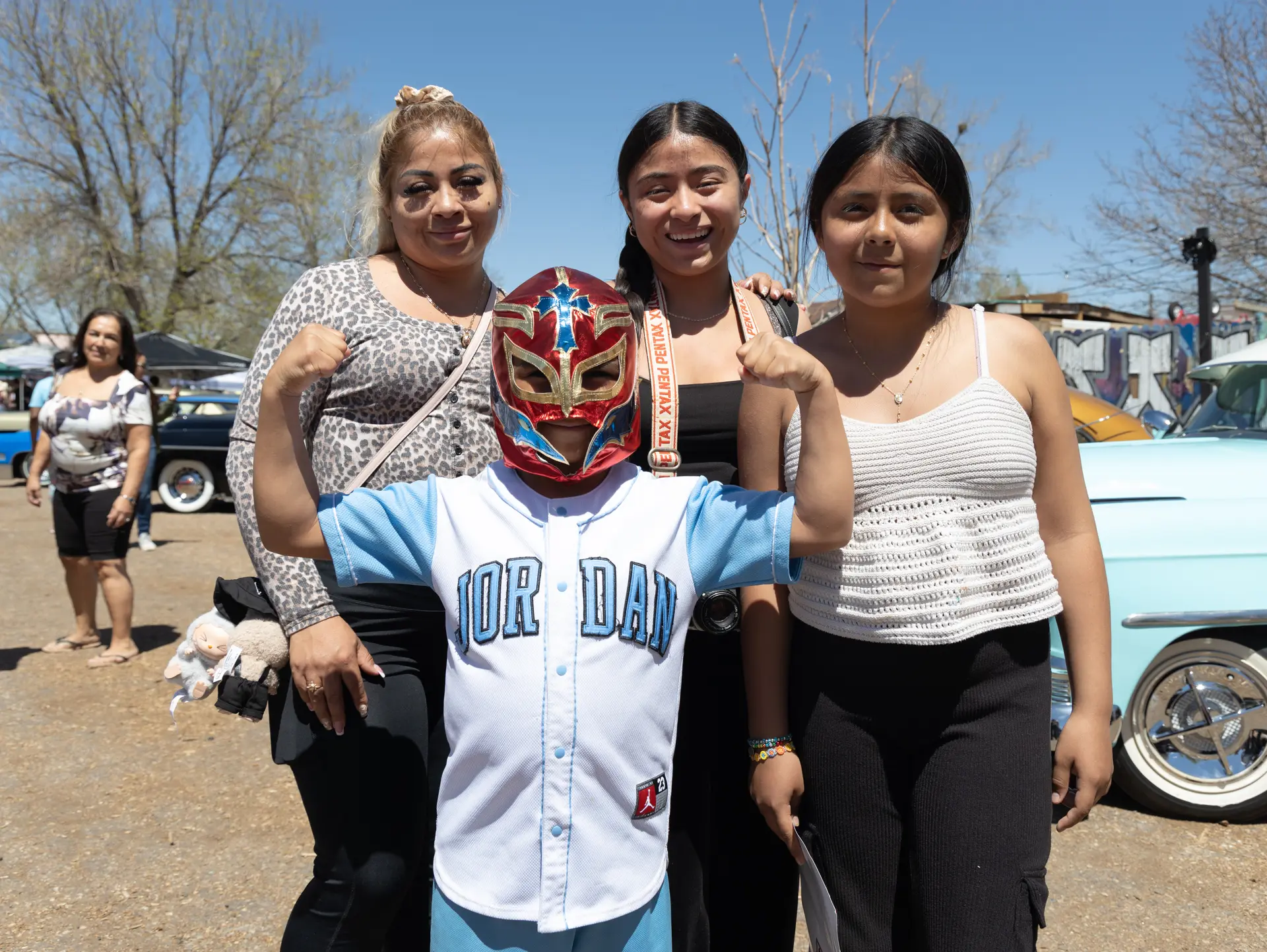 Ana Olivos and her children, Marilyn, Melissa and Juan after watching a lucha libre wrestling match. Photo: Carly Rose, Rocky Mountain PBS