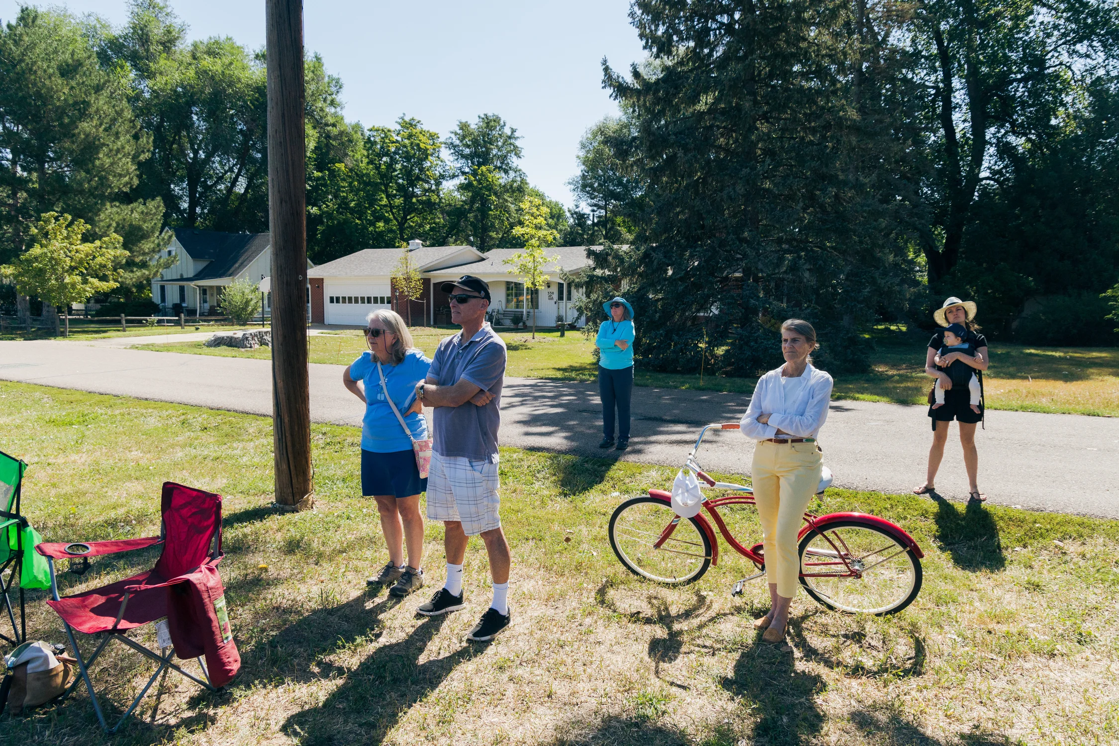 Niwot residents listen to a speech at an August rally against minimum wage increases in Boulder County. Photo: Cormac McCrimmon, Rocky Mountain PBS