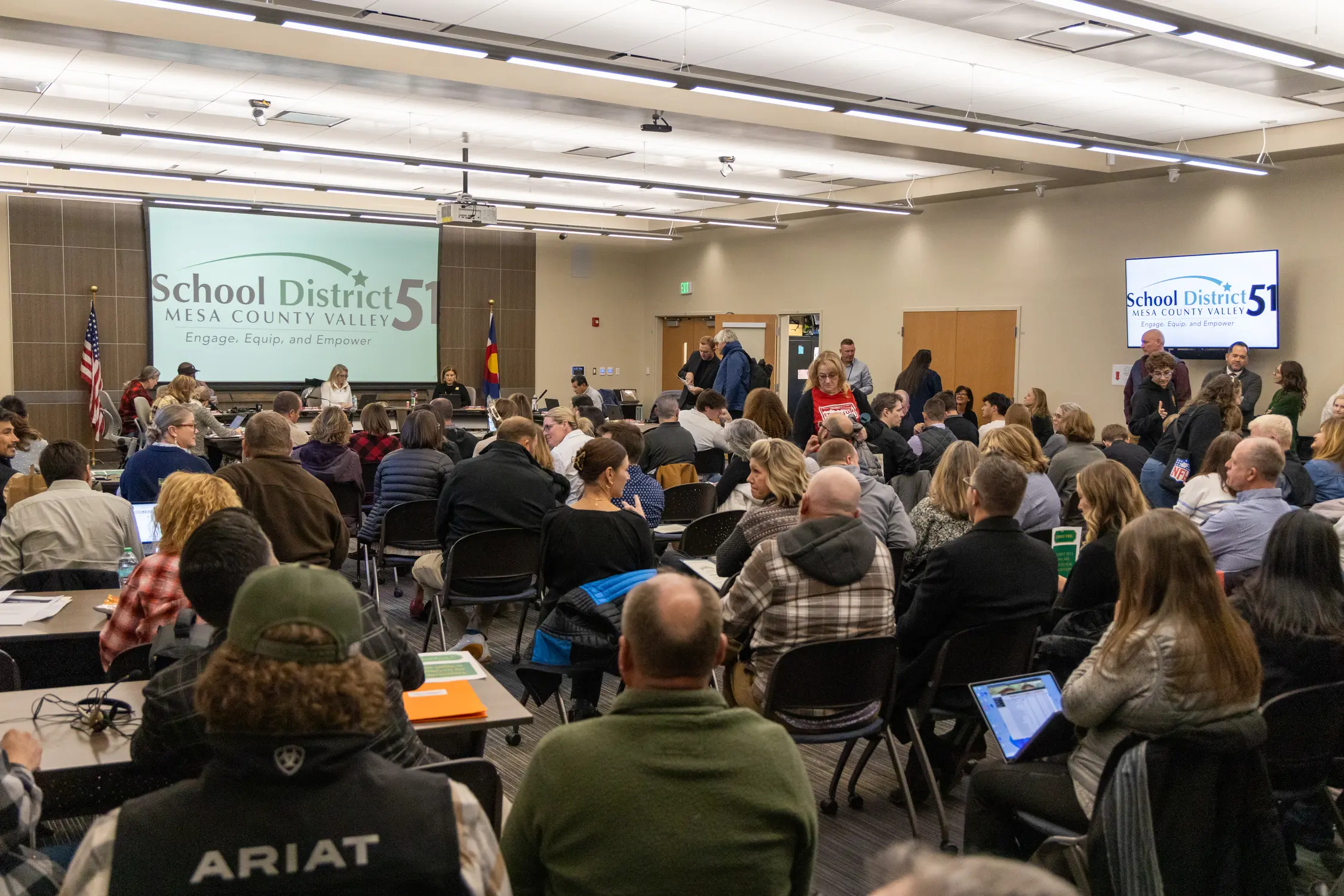 People wait for the Dec. 10 board meeting to start at R5 high school in Grand Junction. Photo: Joshua Vorse, Rocky Mountain PBS